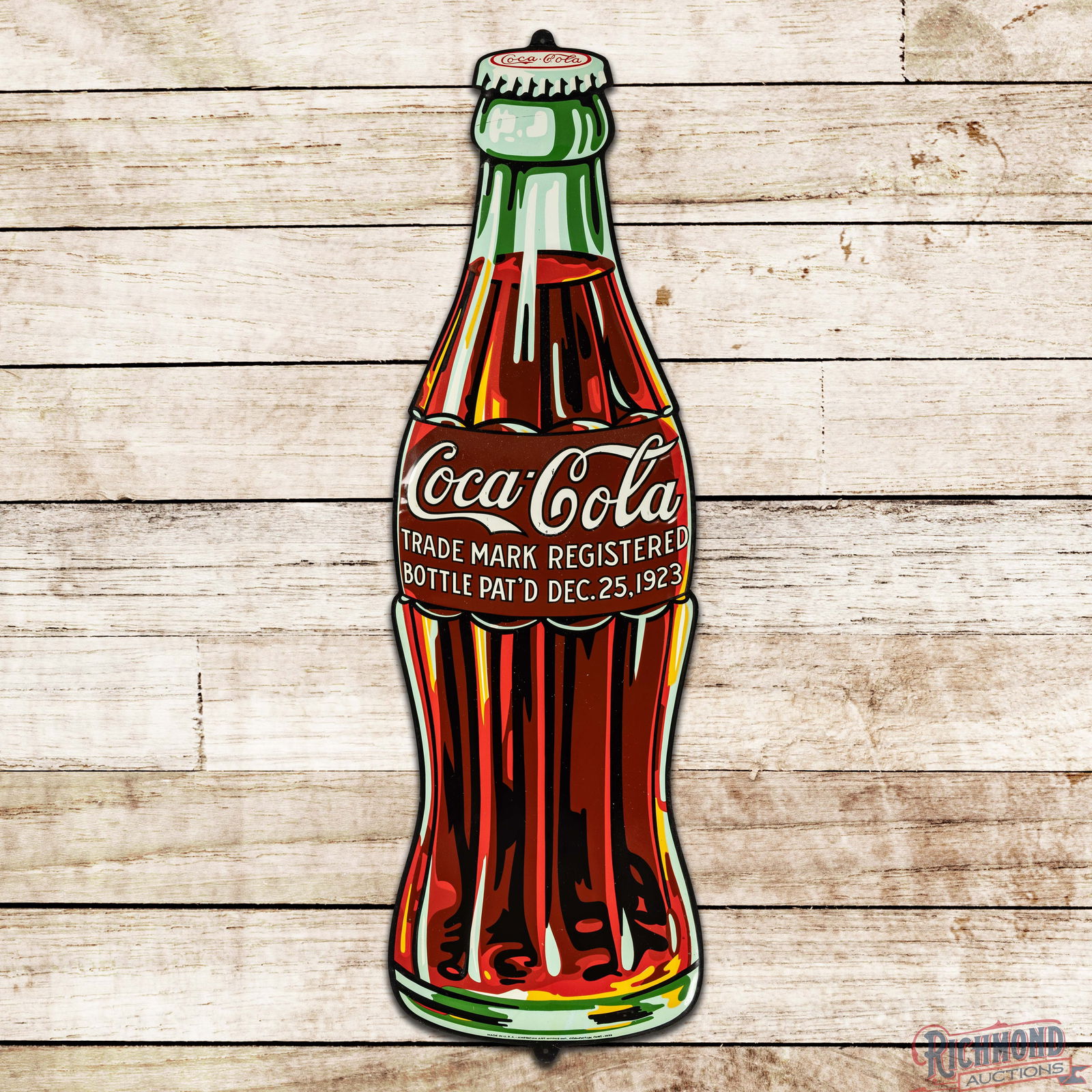 1933 Coca Cola 39" Emb. Convex Single Sided Tin Christmas Bottle Sign: SST (Single Sided Tin) die cut embossed convex sign has excellent color and shine. The field has light wear with small paint chips in the "Coca Cola" lettering. The perimeter has a fine scratch on
