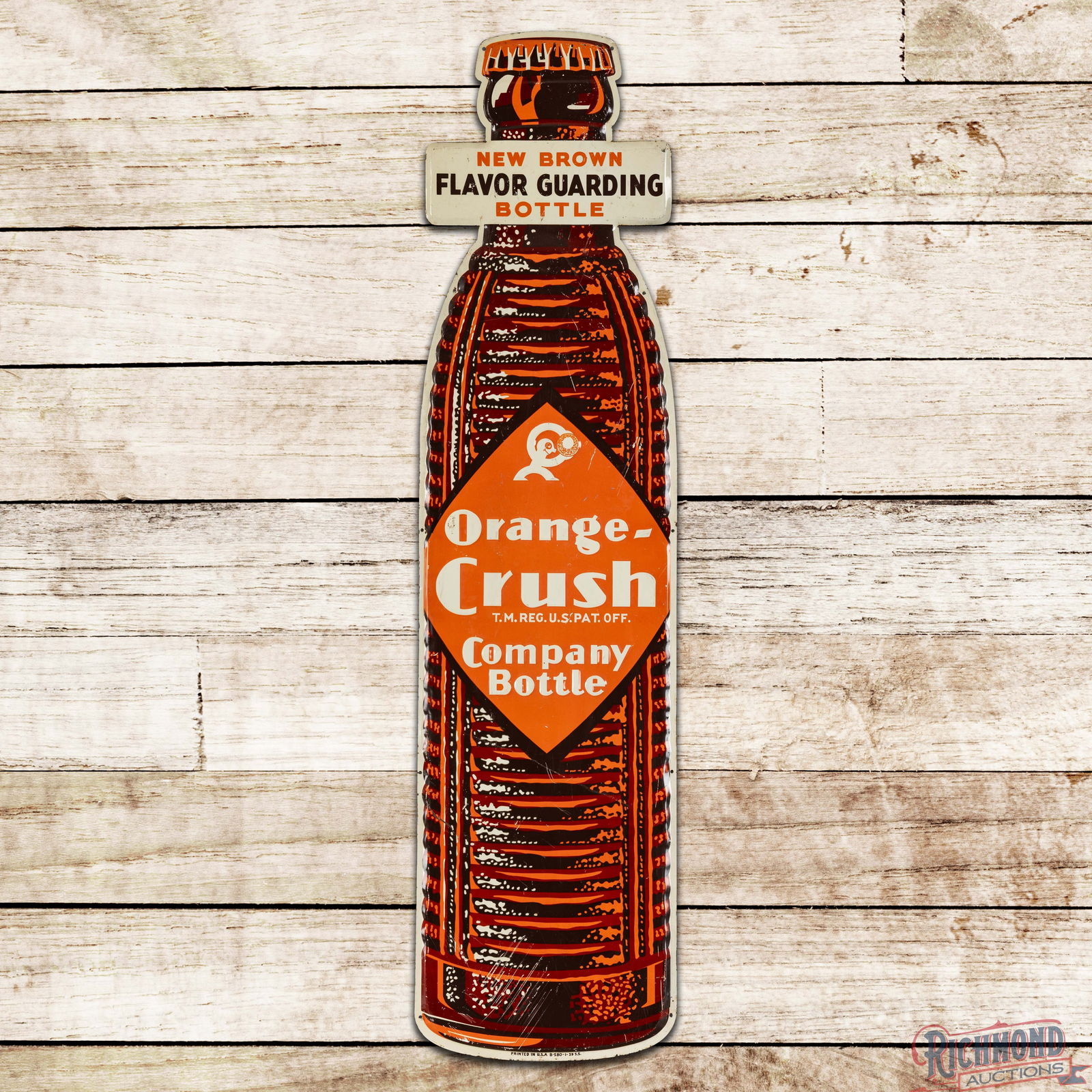 1939 Orange Crush "New Brown Flavor Guarding Bottle" Emb. Die Cut Single Sided Tin Sign w/ Crushy (1 of 3)