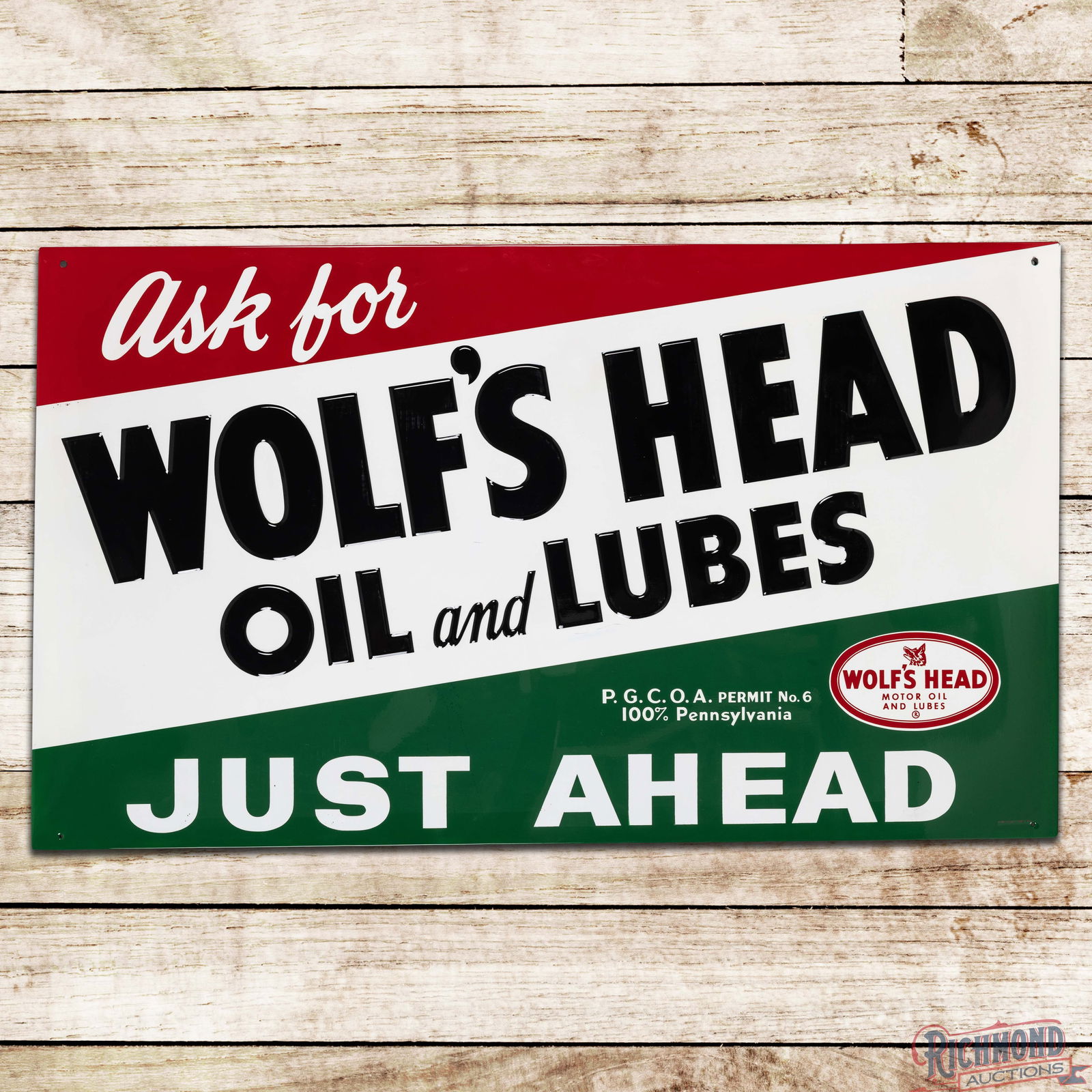 Wolf's Head Oil and Lubes "Just Ahead" Emb. Single Sided Tin Sign w/ Logo (1 of 3)