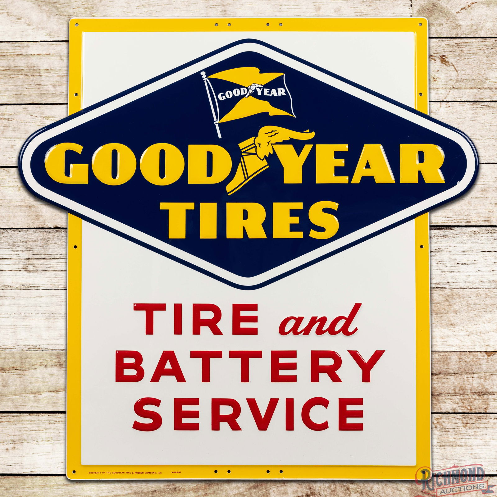 Fantastic 1955 Goodyear Tires and Battery Service Die Cut Emb. Single Sided Tin Sign w/ Logo: SST (Single Sided Tin) die cut embossed sign has excellent color and shine. The field is clean. The perimeter has areas of light wear and a paint chip between the "R" and the edge at 3 o'clock.