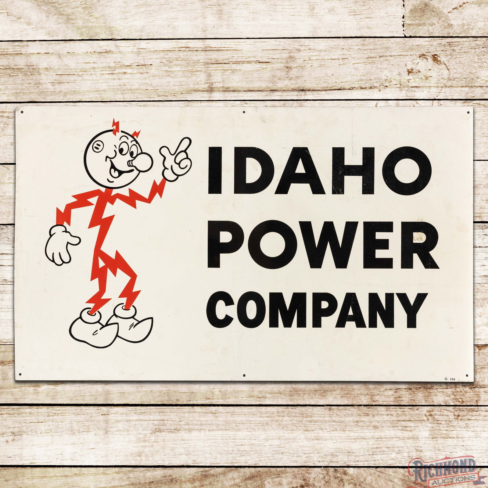 Idaho Power Company Single Sided Tin Sign w/ Reddy Kilowatt: SST (Single Sided Tin) sign has very good color and shine. The field has light wear, fine scratches, and areas of minor discoloration. The outer fields and perimeter have similar wear with minor