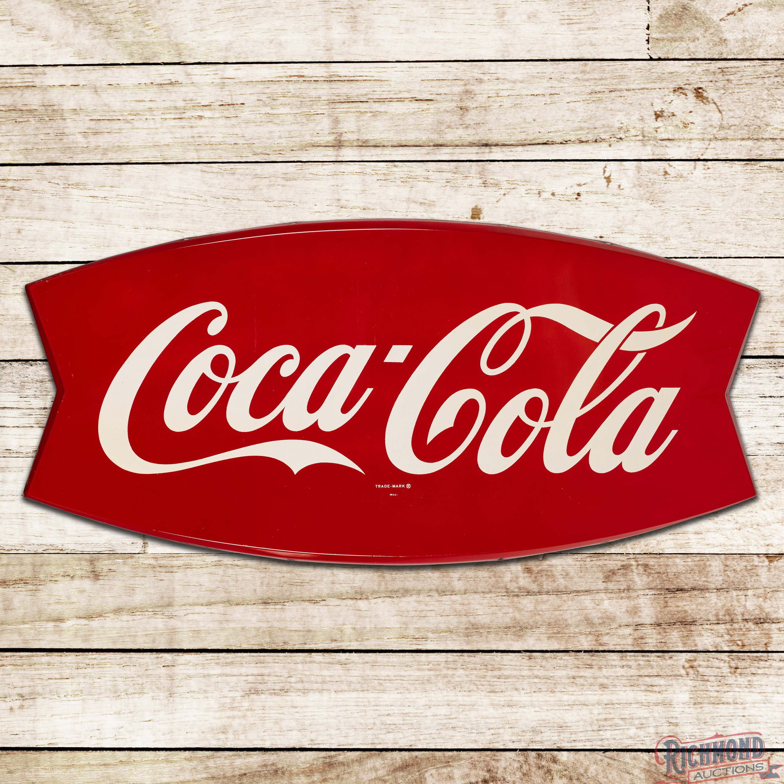 Coca Cola 3.5' Convex Single Sided Tin Fishtail Sign: SST (Single Sided Tin) convex die cut sign has outstanding color and shine. The field has light paper marks with tiny imperfections in the outer fields. The perimeter has oxidation and areas of paint