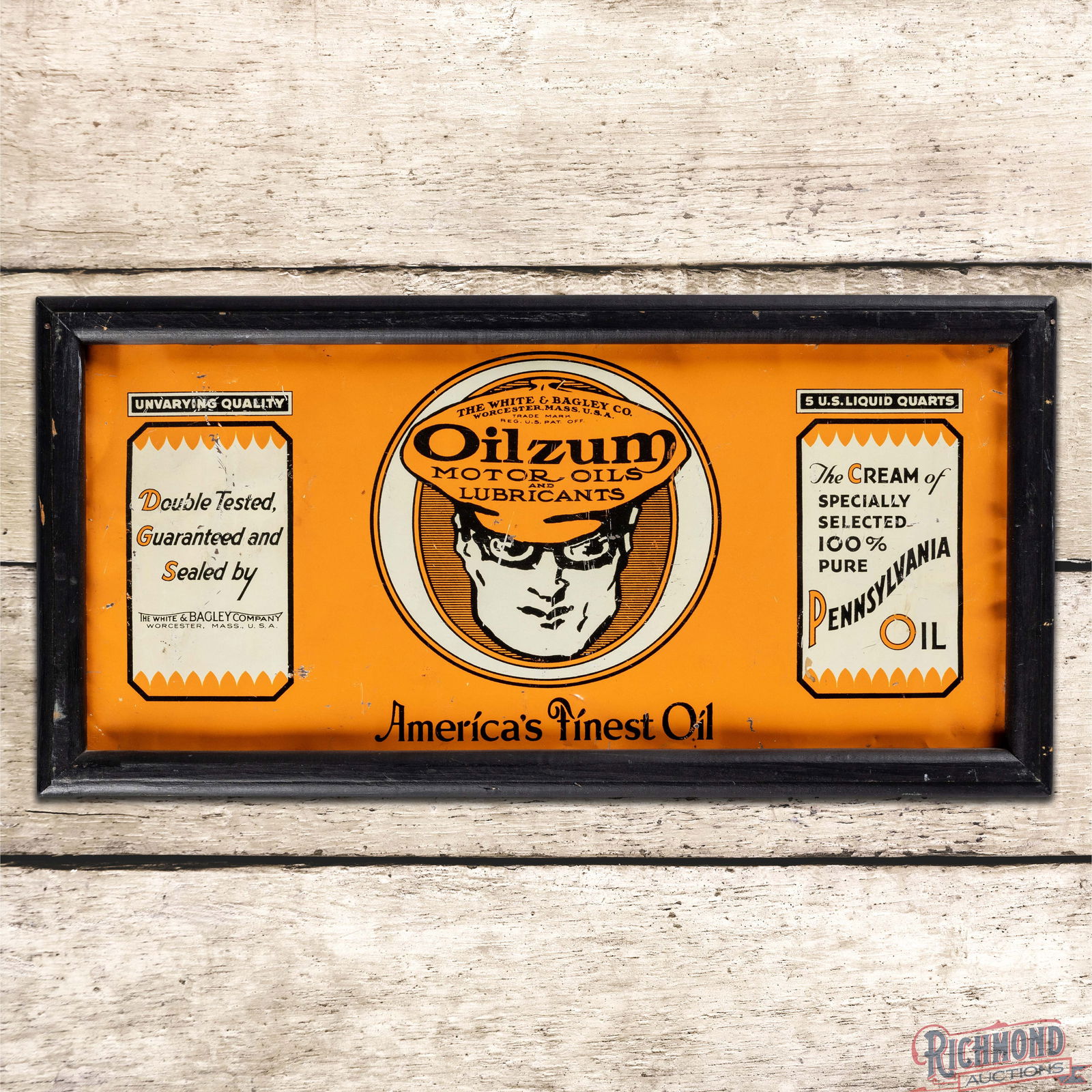 Oilzum America's Finest Oil Framed 5 Quart Can Single Sided Tin Sign: Single sided five quart can flat has been framed. The field has fine scratches with small paint chips, small dings and bends. The outer fields and edges have additional paint chips and bends. The wood