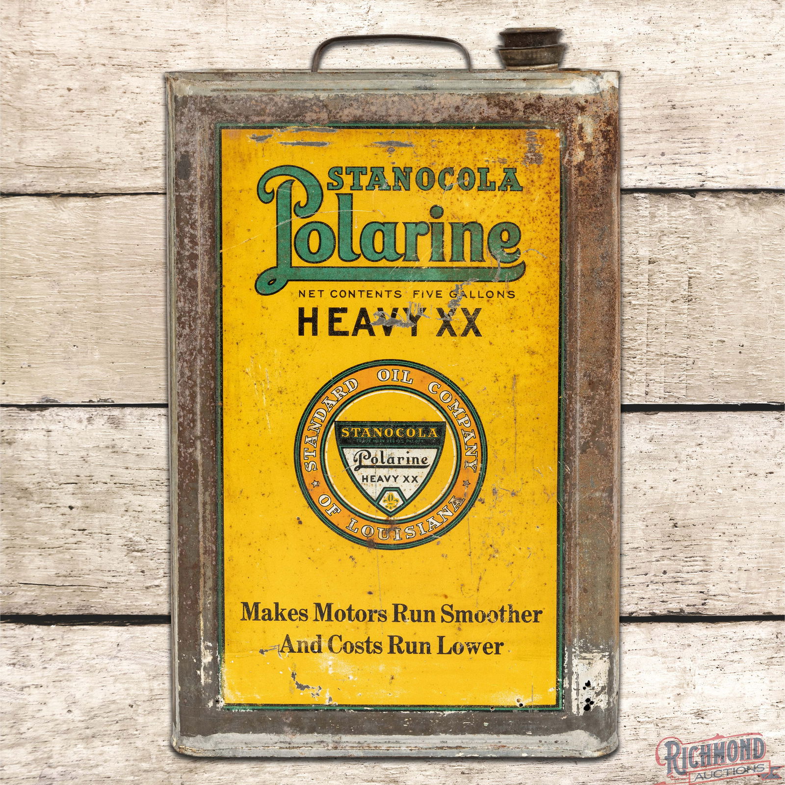 Stanocola Polarine Heavy XX 5 Gallon Metal Motor Oil Can w/ Logo: Empty five-gallon metal can with a handle and cap has good color and shine. The display has general wear with scratches, oxidation and tiny rust holes along the lower edges. The reverse and sides have