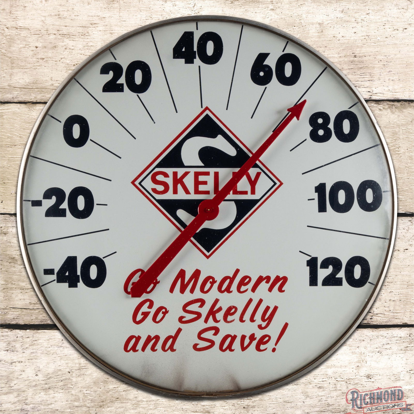 Skelly Go Modern Go Skelly and Save! 18" Jumbo Advertising Thermometer w/ Logo: Glass-faced advertising thermometer has excellent color. The inner face has excellent color with a clean field and areas of discoloration along the lower edges below the lettering. The retaining ring