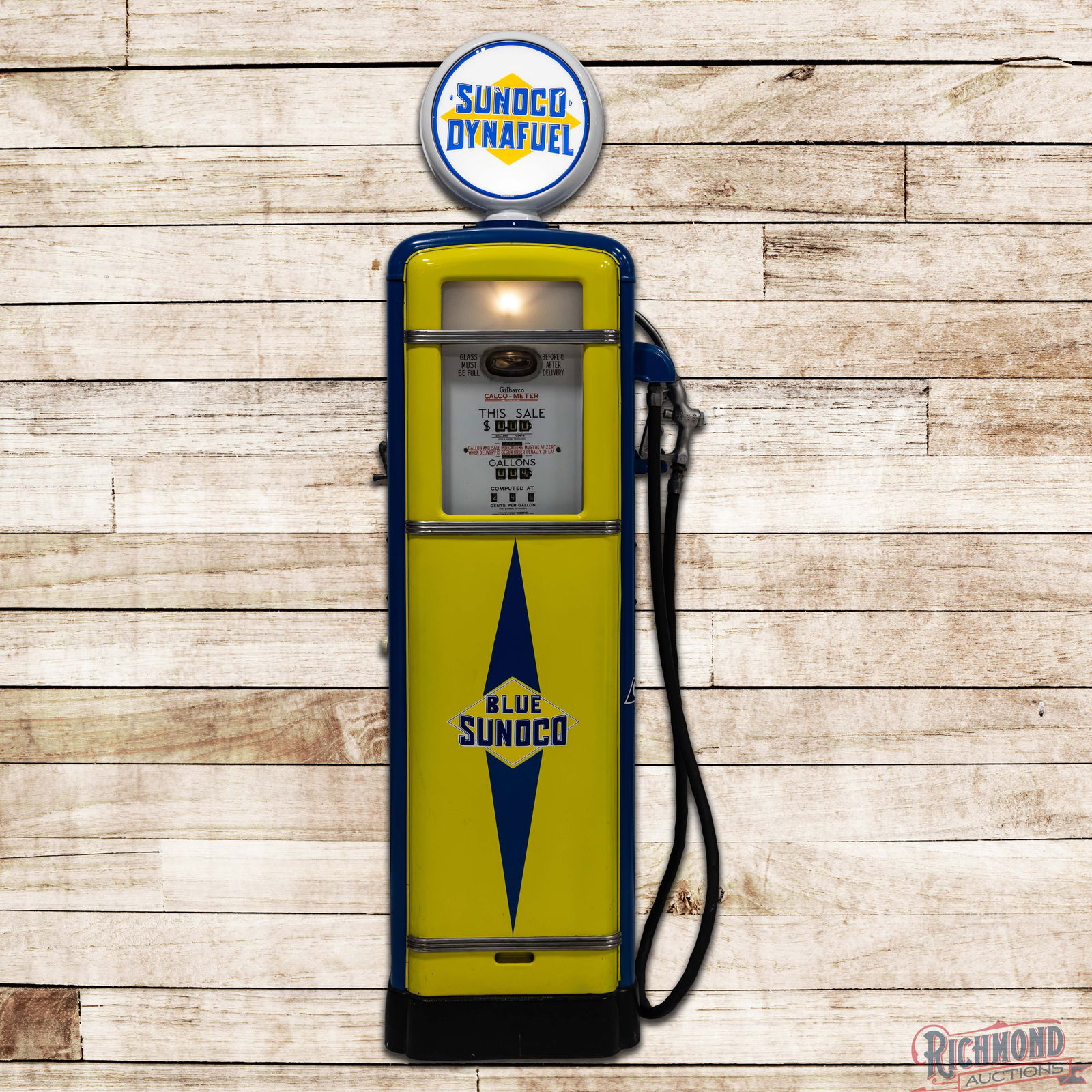 Gilbarco Calco-Meter Computing Gas Pump Restored Sunoco Gasoline: Gilbarco Calco-meter computing pump has been restored. The pump features bright paint with good gloss. The finish has areas of light wear with scuffs, fine scratches, and minor indentations. The origi