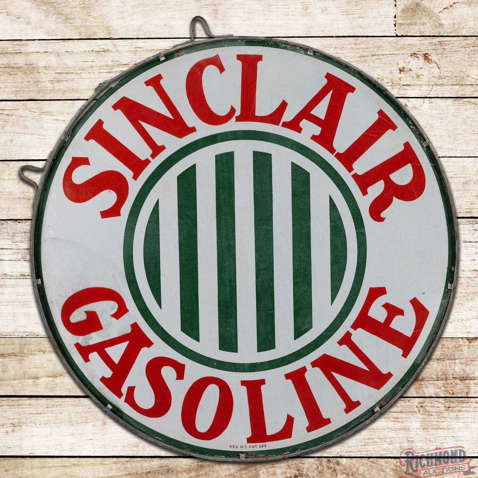 Sinclair Gasoline 4' Single Sided Porcelain Sign w/Factory Ring ""Striped Logo": SSP (Single Sided Porcelain) sign with the factory ring with eyelets has good color and gloss. The display has light surface wear with cloudiness to the green porcelain enamel and discoloration in the