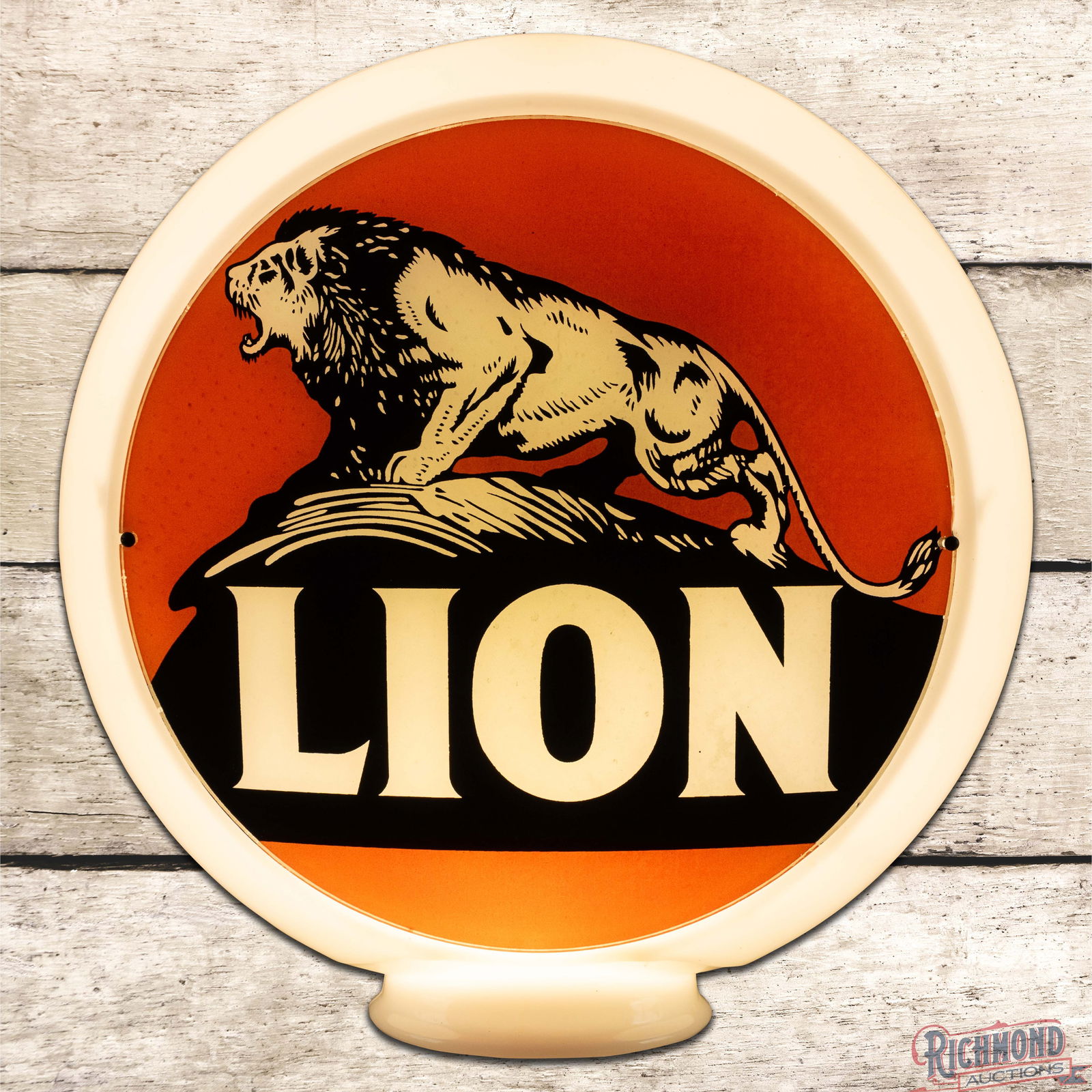Lion Gasoline 13.5" Complete Milk Glass Body Gas Pump Globe: Two 13.5" lenses mounted in a milk glass body. Both lenses have outstanding color and feature the iconic "Lion on the Rock" graphic. Lens #1 has light surface wear with a small chip on the edge at 4