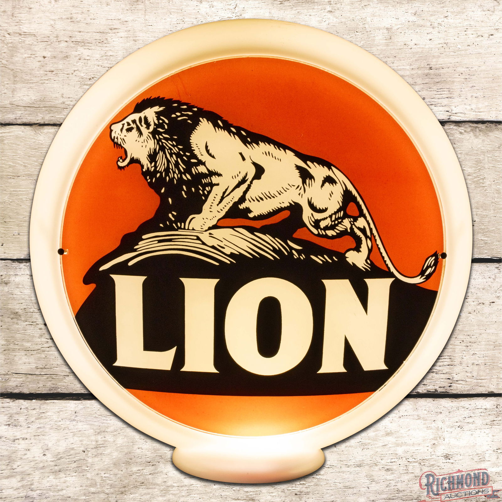 Lion Gasoline 13.5" Complete Milk Glass Body Gas Pump Globe: Two 13.5" lenses mounted in a milk glass body. The lenses have outstanding color and feature the iconic "Lion on the Rock" graphic. Lens #1 has a clean field with small chips along the outer edges.