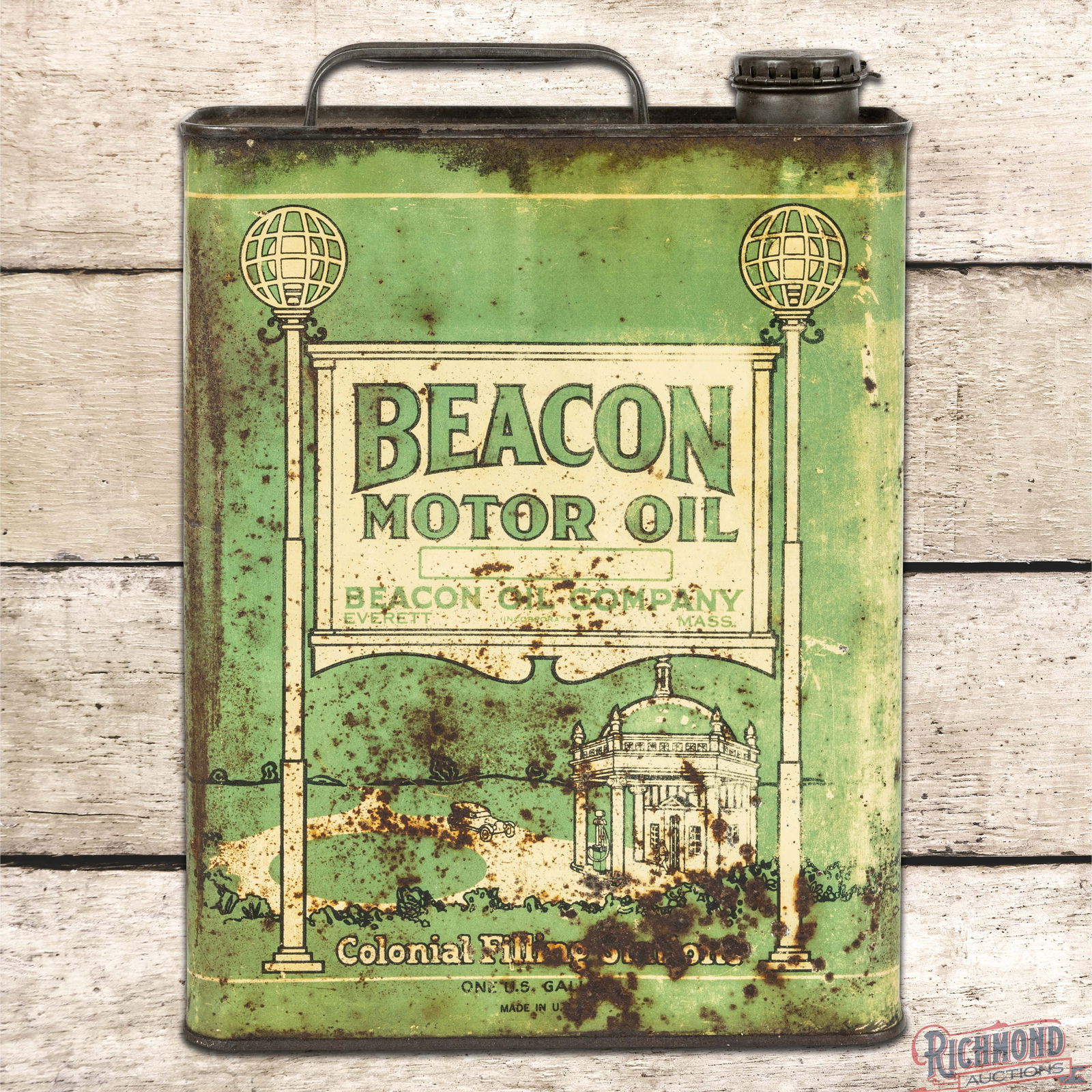 Beacon Motor Oil Colonial Filling Stations 1 Gallon Metal Advertising Can: One gallon empty metal can with lid and handle has moderate color and shine. The display has general wear with oxidation, fading and discoloration. The reverse and sides have heavier wear. The can