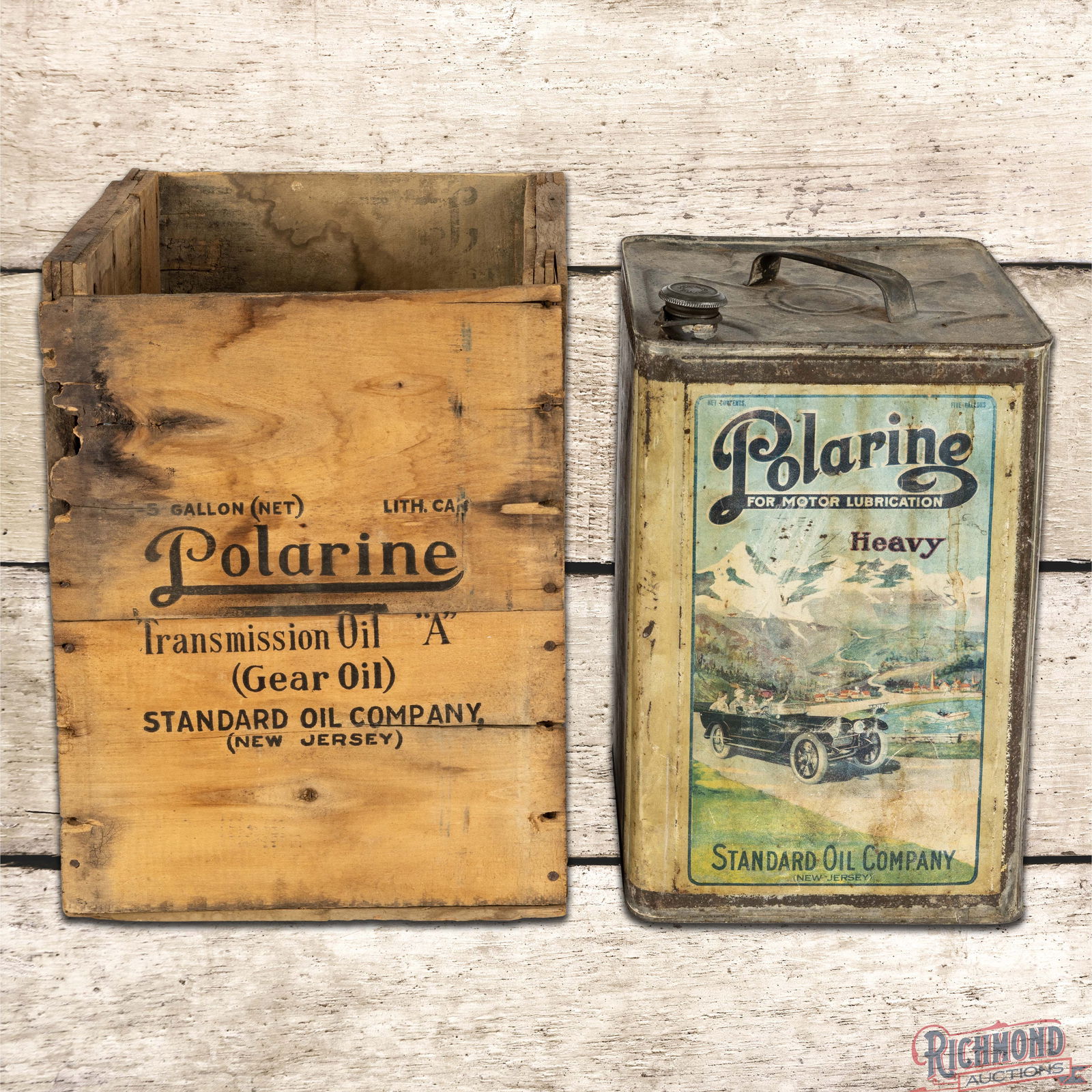 Polarine Standard Oil Co. Heavy 5 Gallon Metal Advertising Can w/ Wooden Crate: Graphic empty five gallon metal can with handle, cap and wooden crate The can has great graphics of an early touring car on both sides. The display has general wear with errant penciled writing and