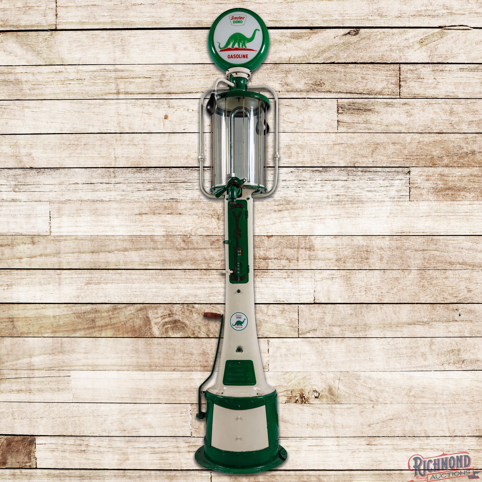 Fry Mae West Ten Gallon Visible Gas Pump Restored Sinclair: Fry Mae West ten gallon visible gas pump has been restored. The pump features vibrant green and white paint with paint chips and light wear throughout. The pump includes the handle, decals on the