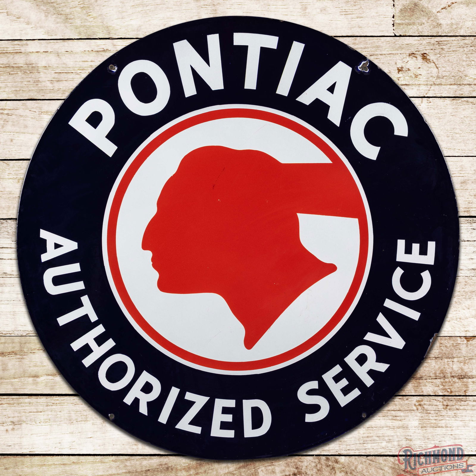 Iconic Pontiac Authorized Service 42" Double Sided Porcelain Sign w/ Native American Logo: DSP (Double Sided Porcelain) sign has outstanding color and gloss. The sign features the "Cut Feather" logo in the field on both sides. The display has marks with tiny nicks in the fields. The