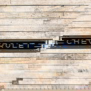 Chevrolet Automobiles 17' Horizontal Single Sided Porcelain Factory Neon Sign: SSP (Single Sided Porcelain) multi-piece factory neon sign with the original can and bullnoses has very good color and gloss. The sign features brilliant two-color neon, which pairs well with the