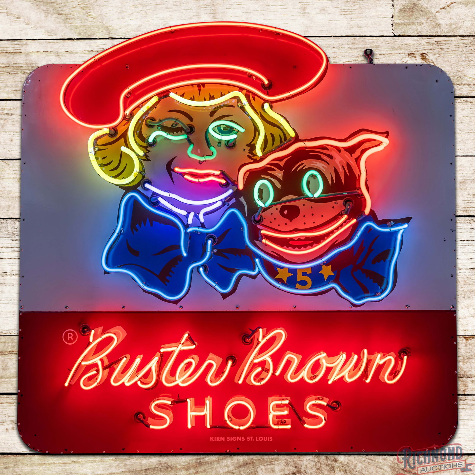 Buster Brown Shoes 4.5' Single Sided Porcelain Factory Neon Sign w/ Tige: SSP (Single Sided Porcelain) die cut factory neon sign with a metal can has excellent color and gloss. The sign features seven-color neon with a "winking" Buster Brown eye. The fields are very clean o