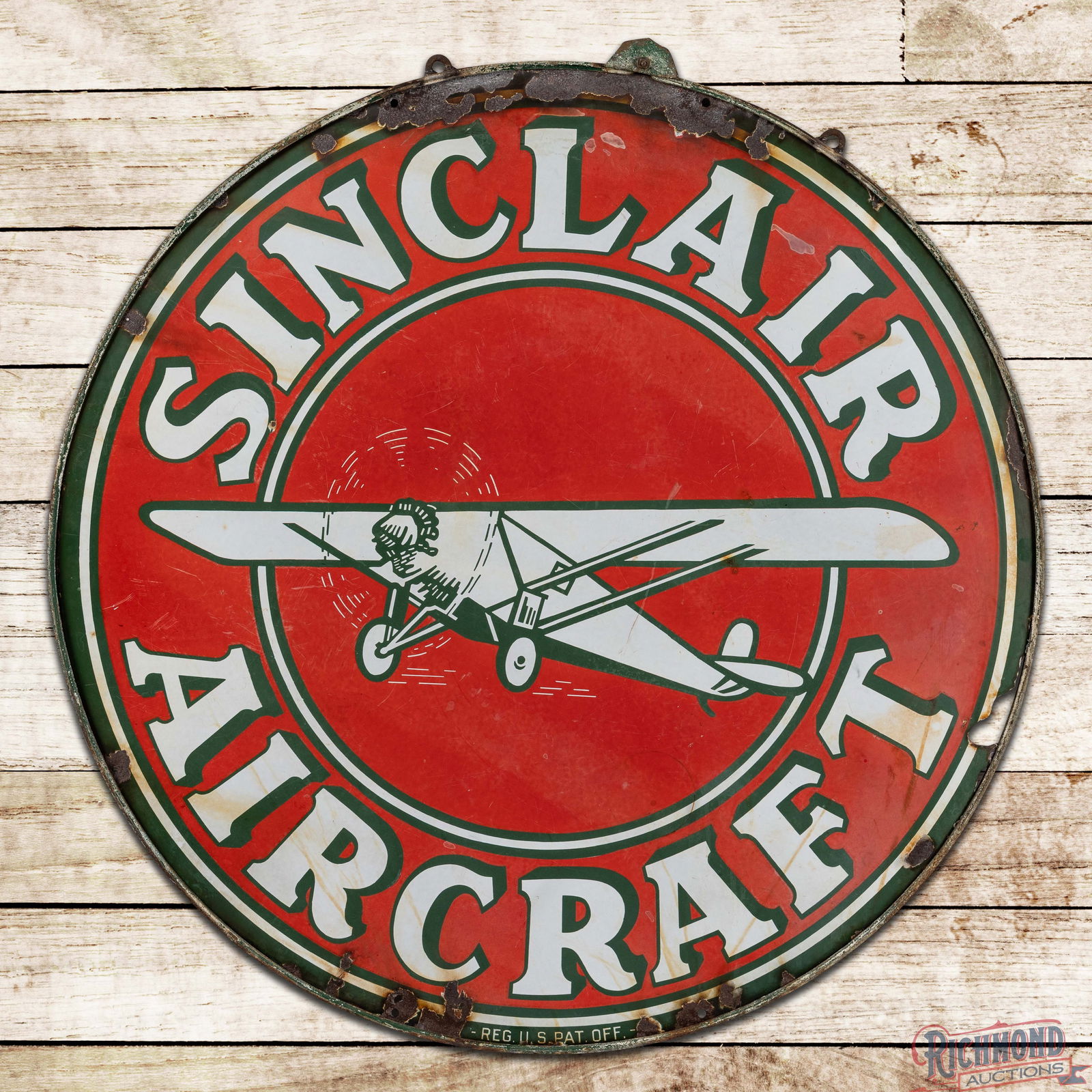 Sinclair Aircraft 48" Double Sided Porcelain Sign w/ Ring: DSP (Double Sided Porcelain) sign with the original ring has good color and moderate gloss. Side #1 has general surface wear with small chips and areas of discoloration in the fields. The perimeter