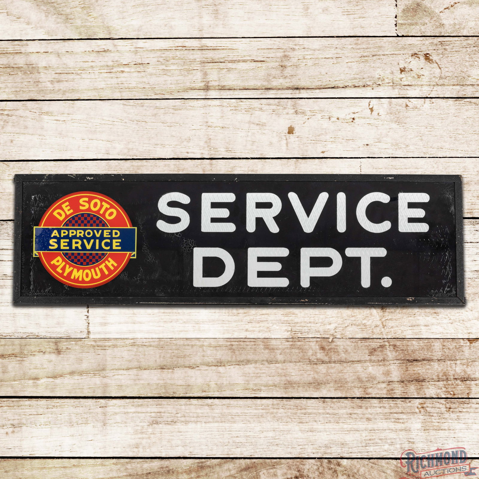 DeSoto Plymouth Approved Service Dept. Reverse on Glass DS Dealer Sign: Double sided reverse on glass sign with metal frame has good color. The display has light wear with moderate paint loss in the lettering and additional loss in the outer fields. The reverse has