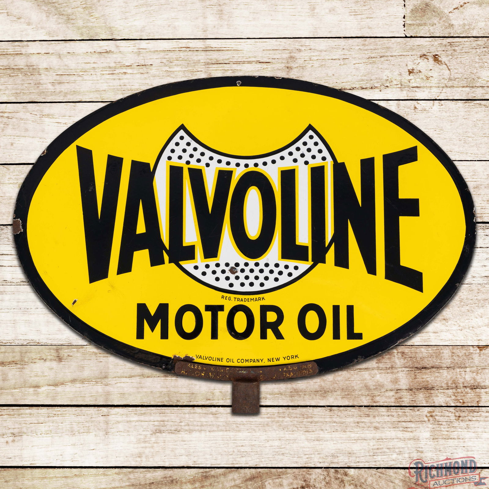 Valvoline Motor Oil Double Sided Porcelain Sign w/ Logo: DSP (Double Sided Porcelain) oval sign with post mount bracket has excellent color and gloss. The display has light surface wear with crazing in the lower edges of the logo. The perimeter has a small