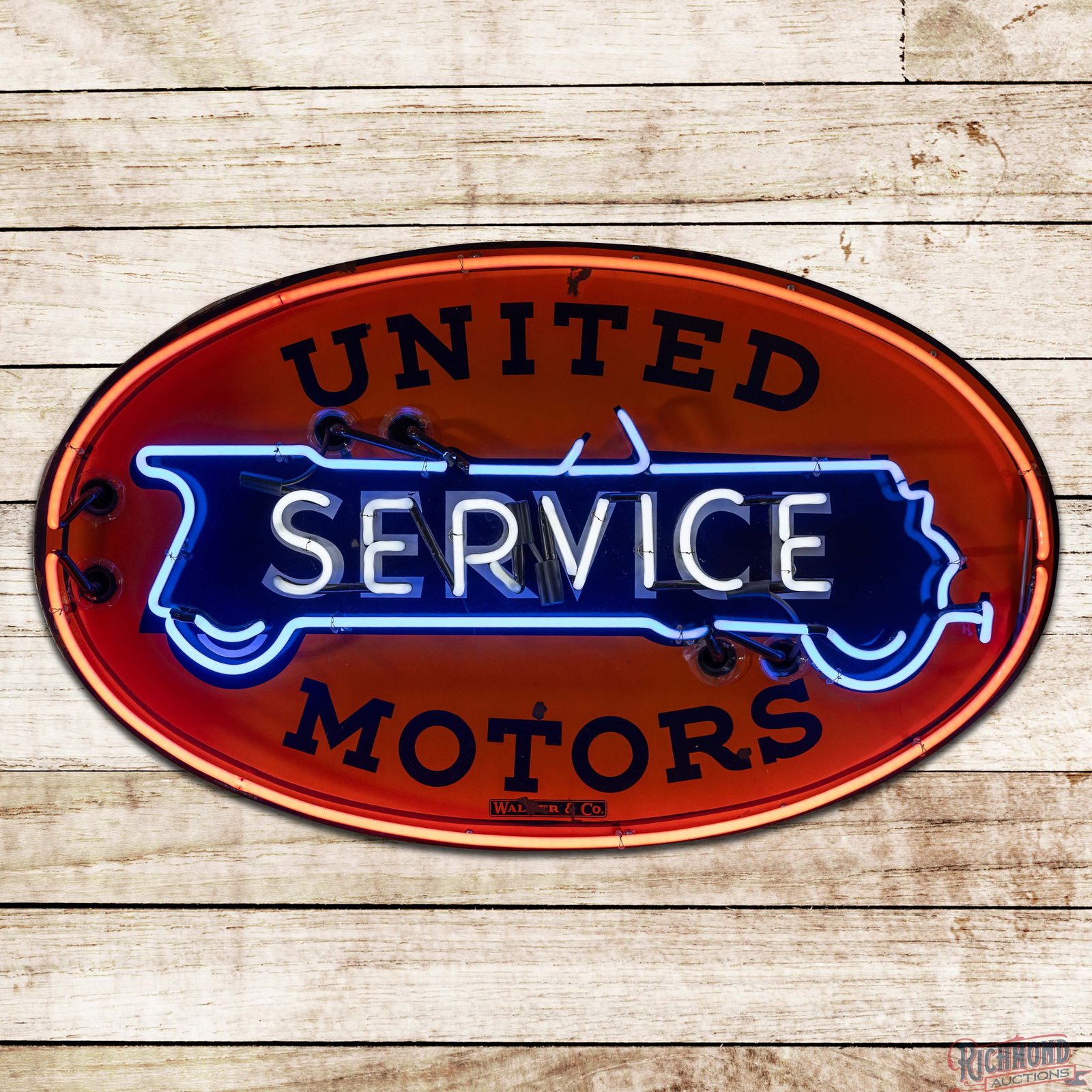 United Motors Service 4' Single Sided Porcelain Factory Neon Sign w/ White Wheels: SSP (Single Sided Porcelain) factory neon sign with a metal can has excellent color and gloss. The sign features three-color neon with the seldom-seen white wheel automobile graphic. The field present