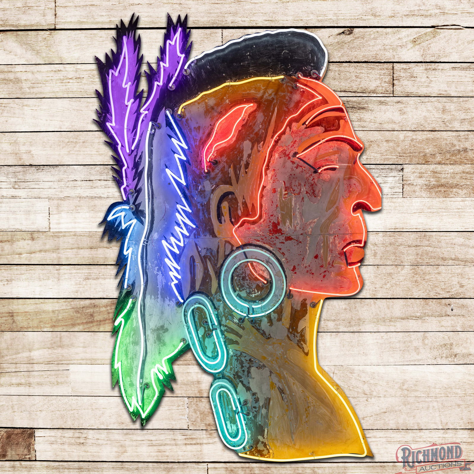 Towering 8' Native American Warrior Backlit Sign w/ 7 Color Neon: Die cut single sided backlit metal sign with added seven color neon. The sign features good color with numerous areas of older repaint, paint chips and surface imperfections. The sign has added LED ba