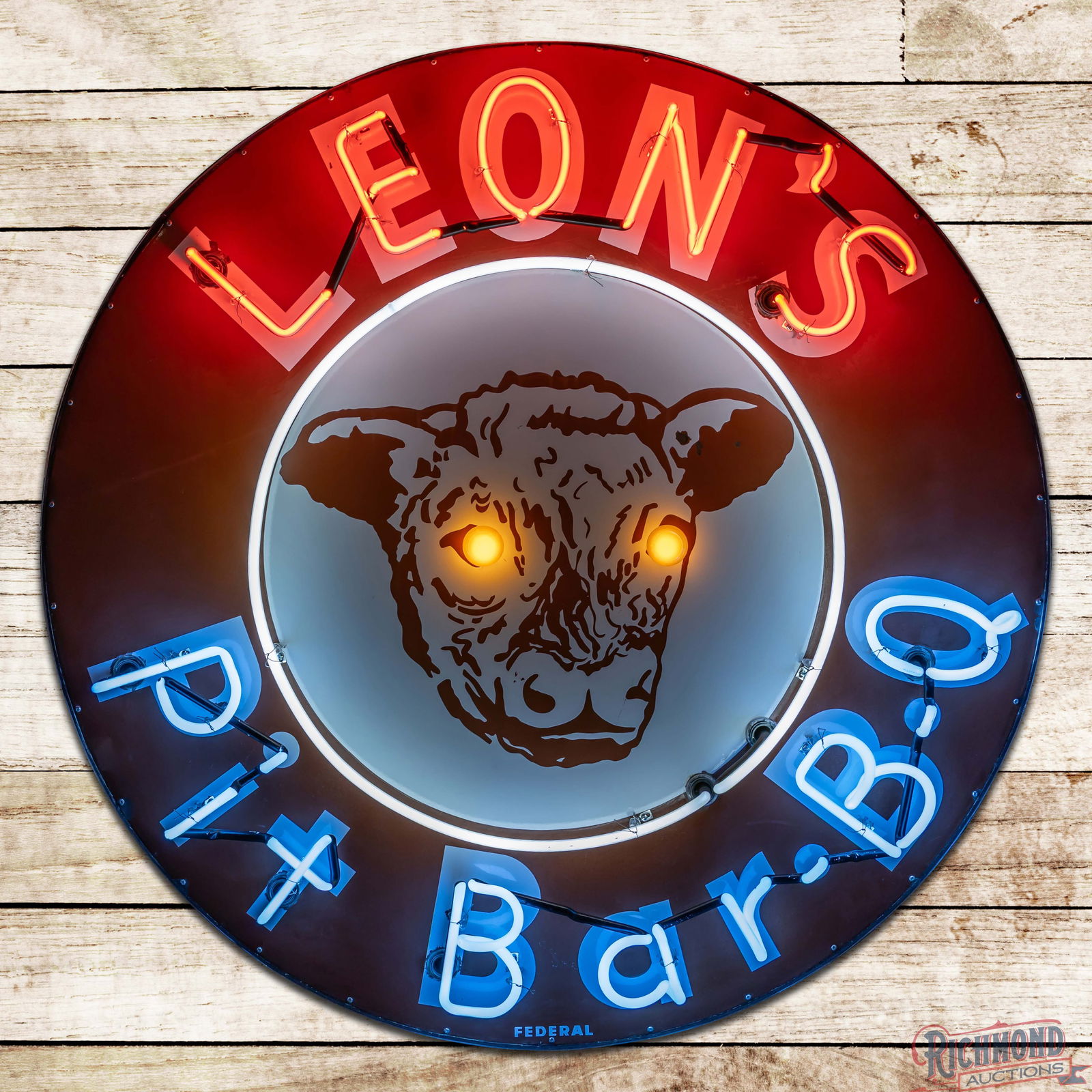 Leon's Pit Bar-B-Q 48" Single Sided Porcelain Neon Sign w/ Bulbs: SSP (Single Sided Porcelain) sign with added neon, eye bulbs and metal can has very good color and gloss. The sign features vibrant three-color neon with lighted bulb eyes. The field has light wear wi