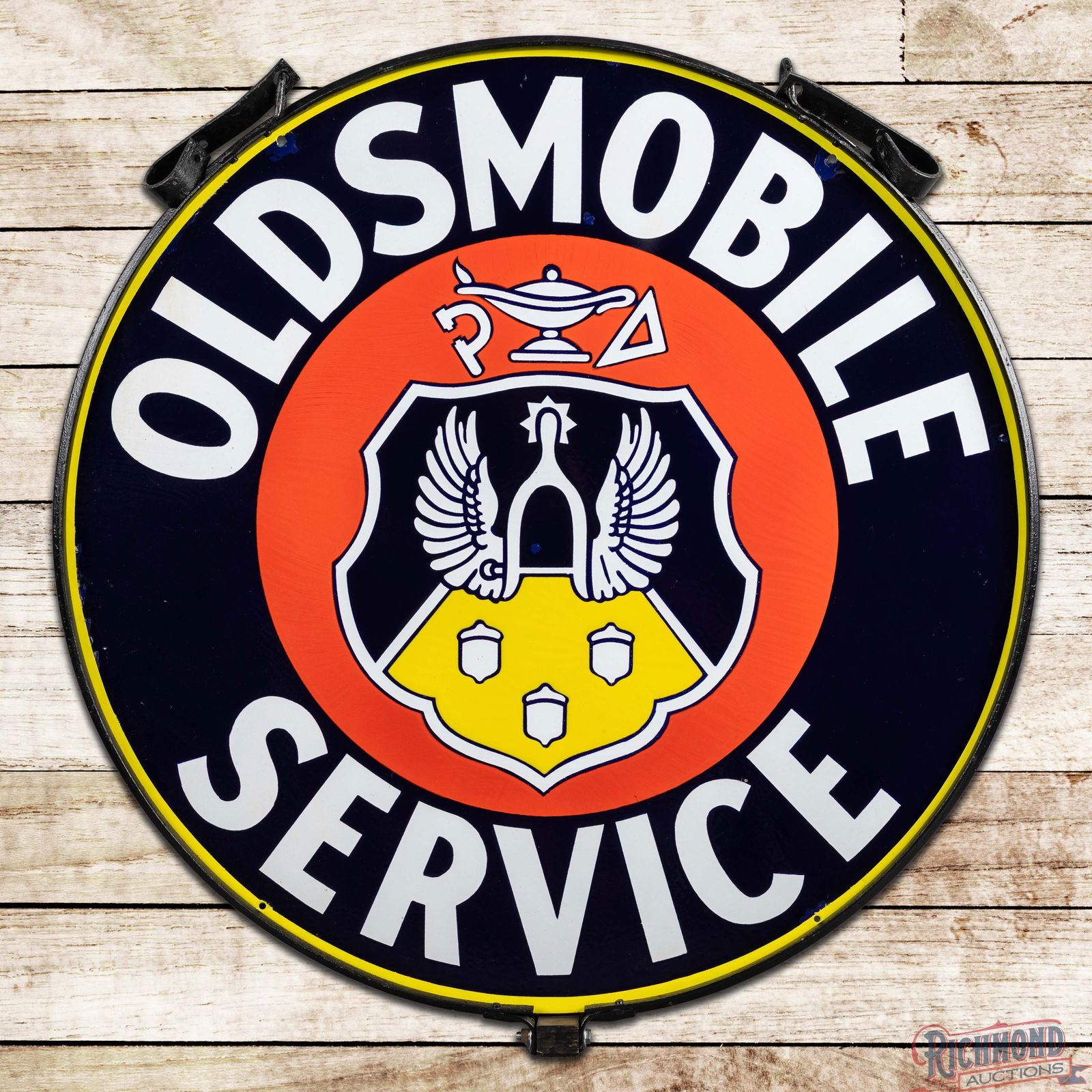 Oldsmobile Service 42" Double Sided Porcelain Crest Logo Sign w/ Ring: DSP (Double Sided Porcelain) sign with ring has outstanding color and gloss. The display field has two dime-sized or smaller color matched chips with a few tiny flea bites. The perimeter has small are