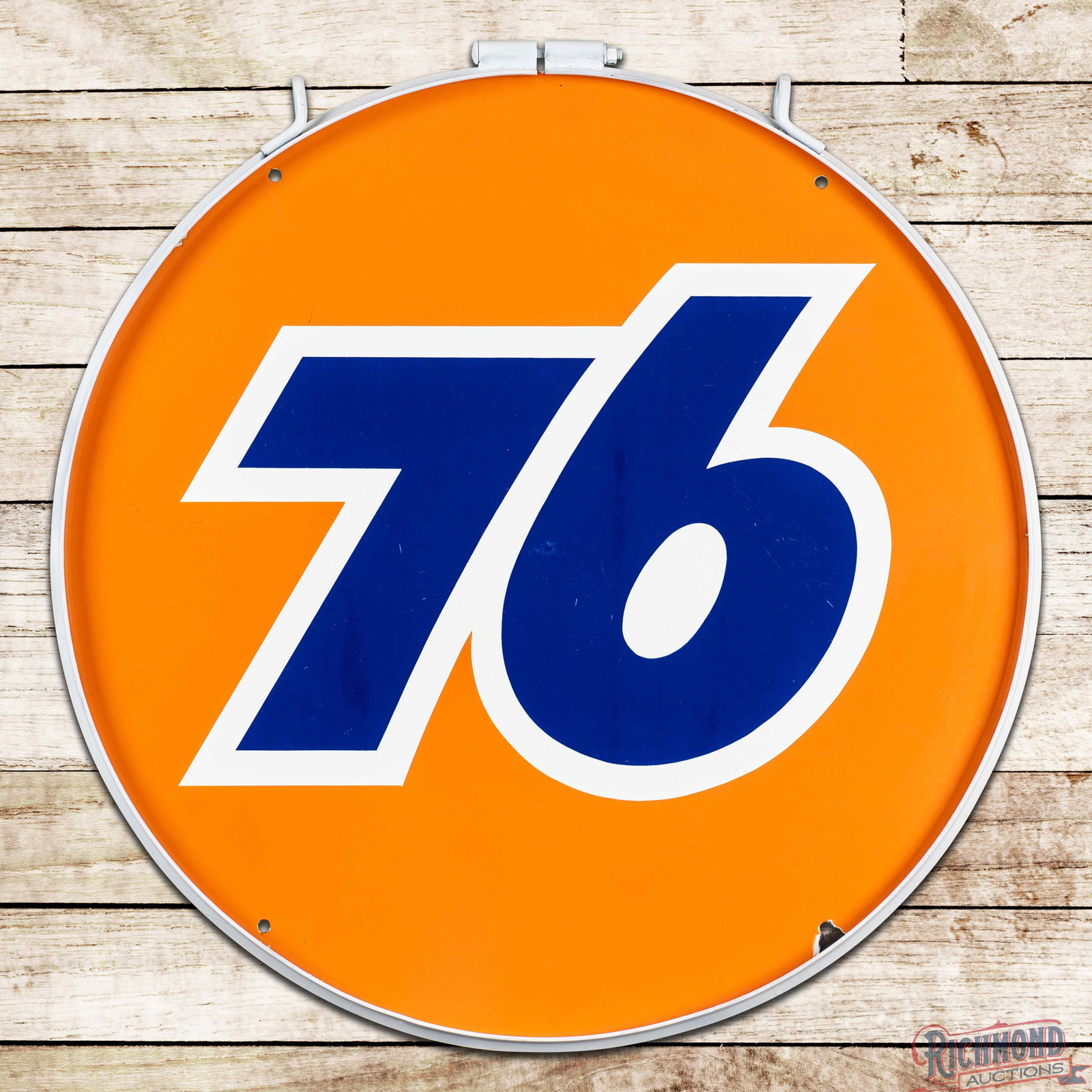 Union 76 Gasoline 30" Single Sided Porcelain Logo Sign w/ Ring: SSP (Single Sided Porcelain) sign has excellent color and gloss. The field exhibits light wear with fine scratches. The perimeter has minor crazing with chips along the outer edges. The sign is