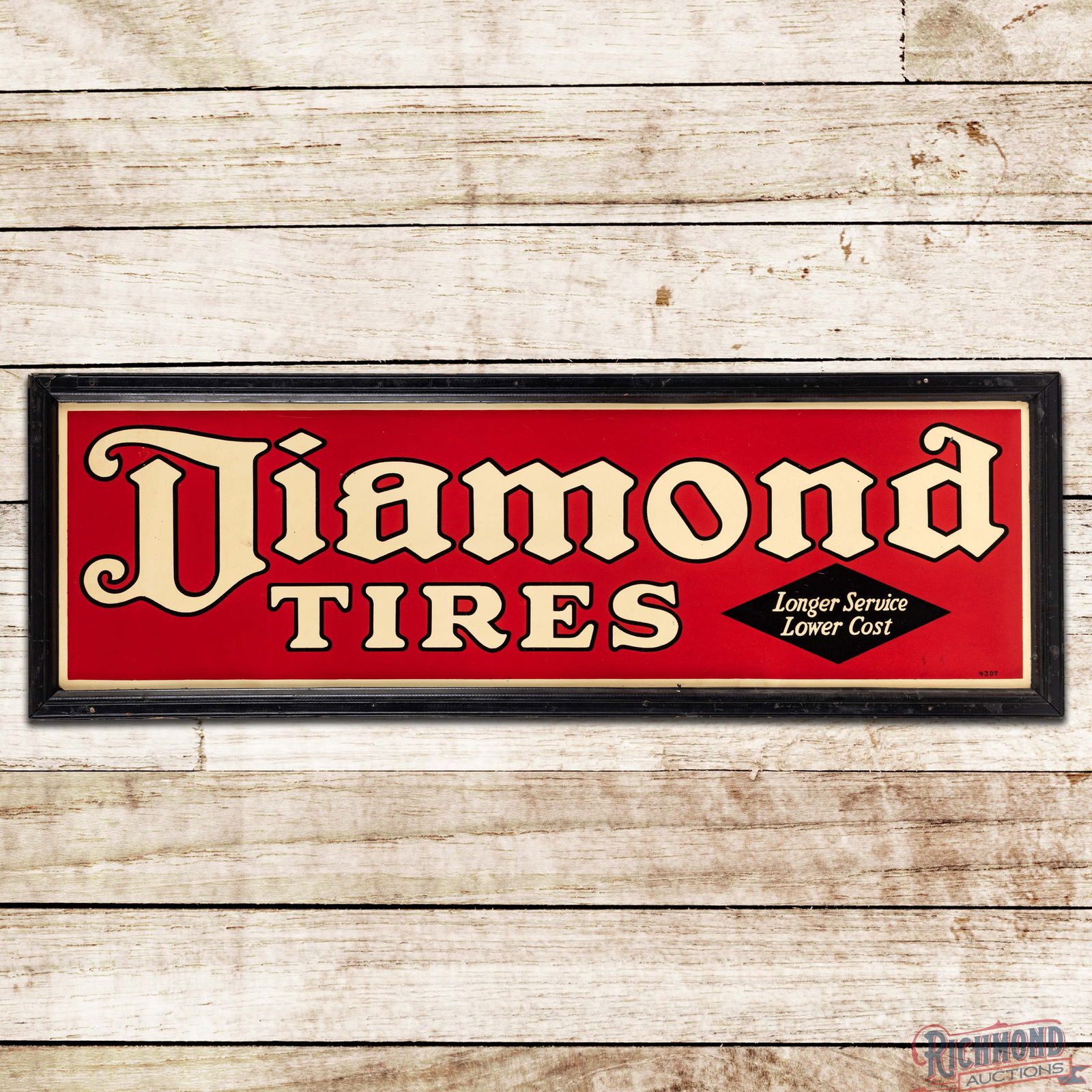 Diamond Tires "Longer Service Lower Cost" 5' Single Sided Tin Sign w/ Wooden Frame: SST (Single Sided Tin) sign with factory wooden frame has excellent color and shine. The field exhibits light surface wear with a few small paint chips in the upper field. The perimeter has minor