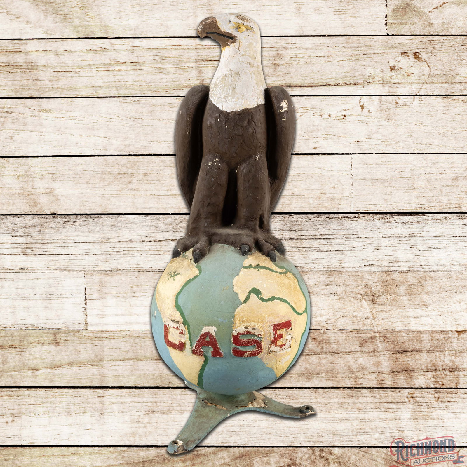 Case Tractors Implements "Old Abe" Fiberglass Eagle Statue: Die cut fiberglass "Old Abe" Case eagle statue has very good color. The statue has a great look and features Old Abe sitting atop the world. The statue features older paint with age-related wear throu