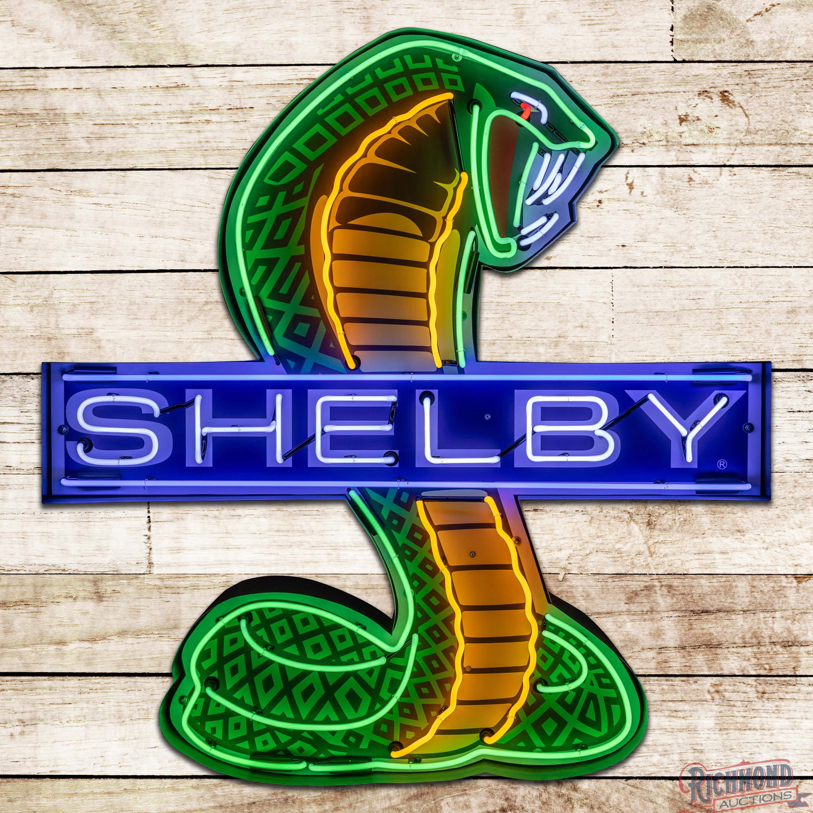 Shelby Cobra Single Sided Tin Die Cut Neon Sign: Custom single-sided metal neon sign with a three-dimensional metal can has excellent color and shine. The sign features the iconic Shelby Cobra snake logo with Shelby lettering in the field. The sign