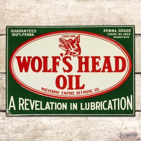 Wolf's Head Oil "A Revelation in Lubrication" Emb. Single Sided Tin Sign w/ Logo