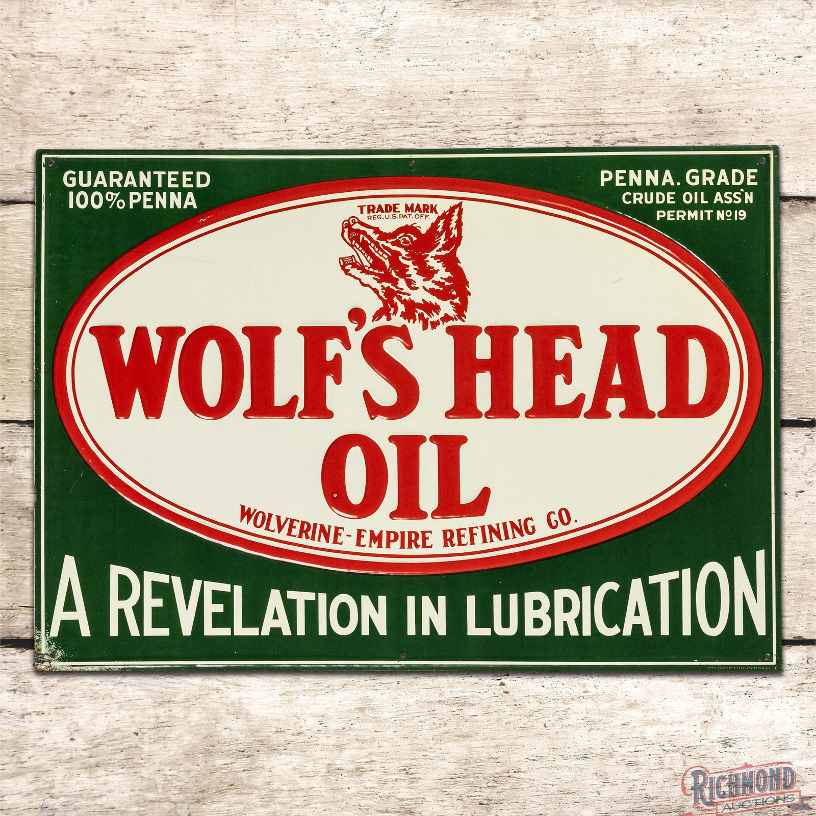Wolf's Head Oil "A Revelation in Lubrication" Emb. Single Sided Tin Sign w/ Logo (1 of 3)