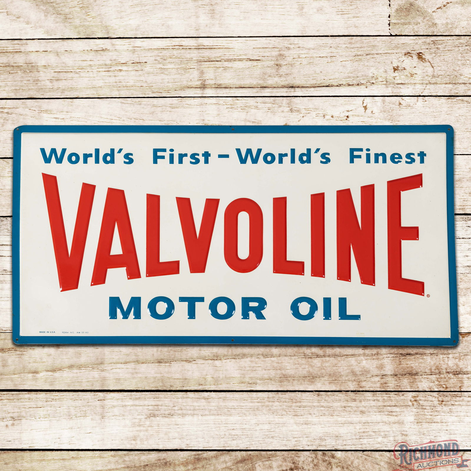 Excellent Valvoline Motor Oil "World's First - World's Finest" Emb. Single Sided Tin Sign: SST (Single Sided Tin) embossed sign has outstanding color and shine. The sign is exceptionally clean with minor surface imperfections and small areas of discoloration along the outer edges. Marked Ma