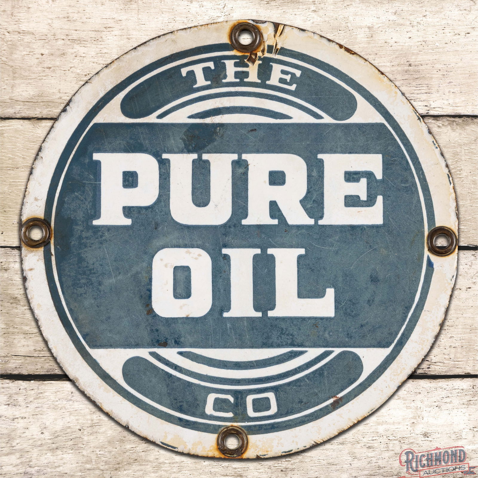 Scarce The Pure Oil Company 8" Single Sided Porcelain Sign: SSP (Single Sided Porcelain) sign has good and gloss. The sign exhibits fading throughout with general surface wear in the fields. The perimeter has chips at the upper mounting hoes with wear and disc