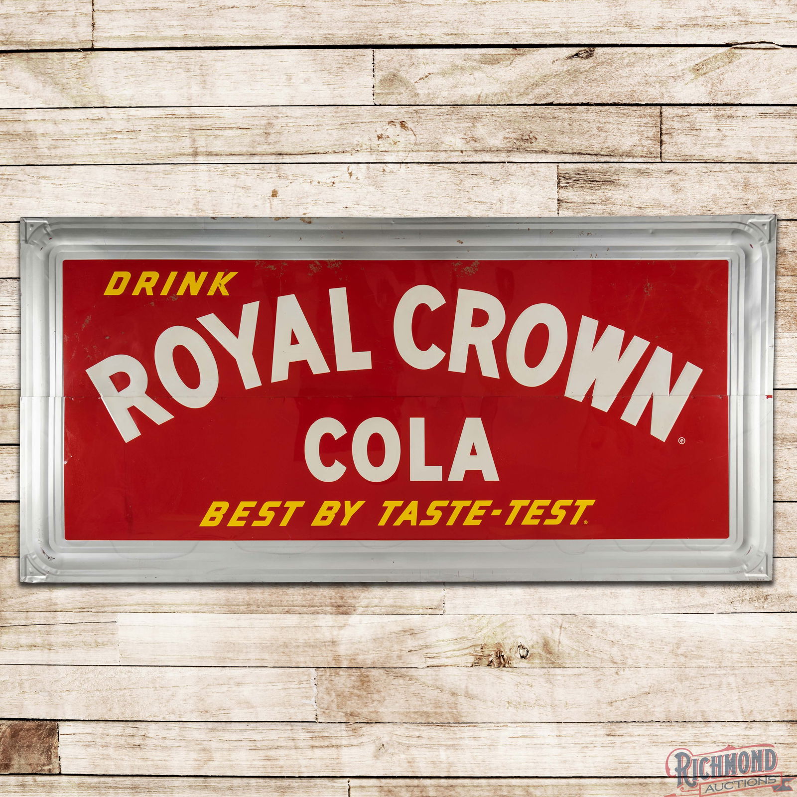 Drink RC Royal Crown Cola "Best by Taste Test" 12' Emb. Single Sided Tin Sign "Large": SST (Single Sided Tin) two-piece embossed self-framed sign with the factory wooden frame has excellent color and shine. The field exhibits light wear with small dings, fine scratches and small