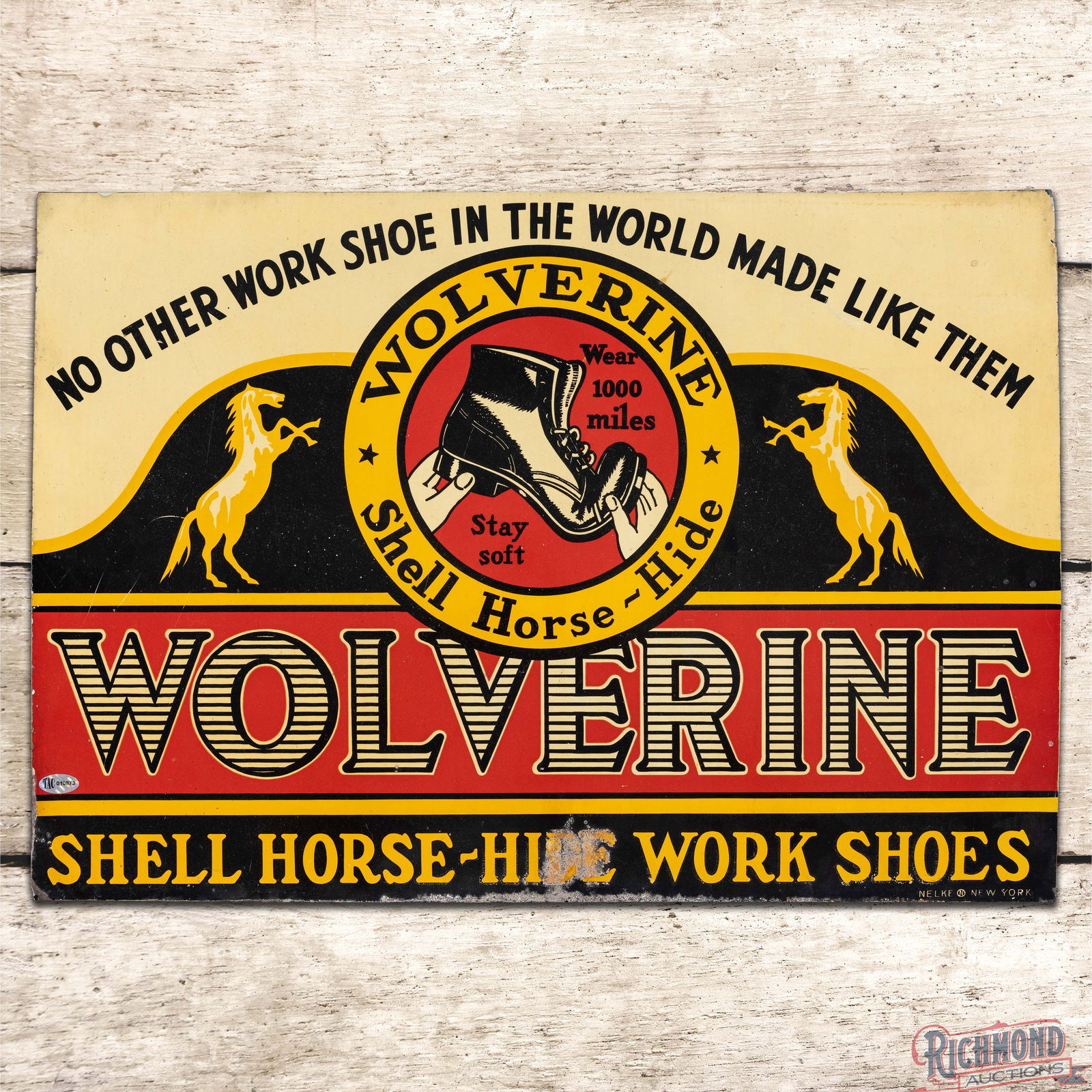 Wolverine Shell Horse Hide Work Shoes Single Sided Tin Sign w/ Logo: SST (Single Sided Tin) sign has excellent color and shine. The display has light wear with fine scratches in the outer fields. The perimeter has minor bends with areas of oxidation in the "DE" of