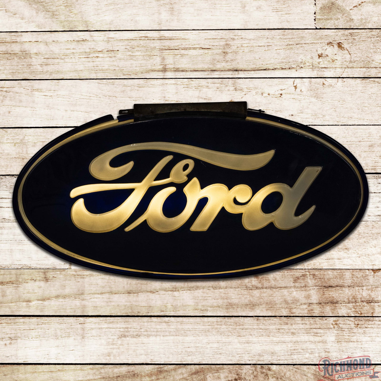 Ford Automobiles 48" DS Emb. Plastic Lighted Sign w/ Bracket: Double sided embossed plastic internally lighted sign with a metal hanging bracket has very good color. Side #1 has light wear in the field with scuffs along the outer edges. The reverse has light