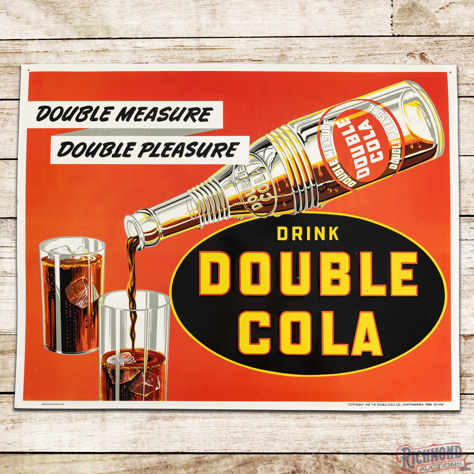 Drink Double Cola "Double Measure Double Pleasure" Emb. Single Sided Tin Sign w/ Bottle & Glasses: SST (Single Sided Tin) embossed crimped edge sign has excellent color and shine. The field is very clean overall with tiny scratches in the left field and small paint chips in the "Double Cola"