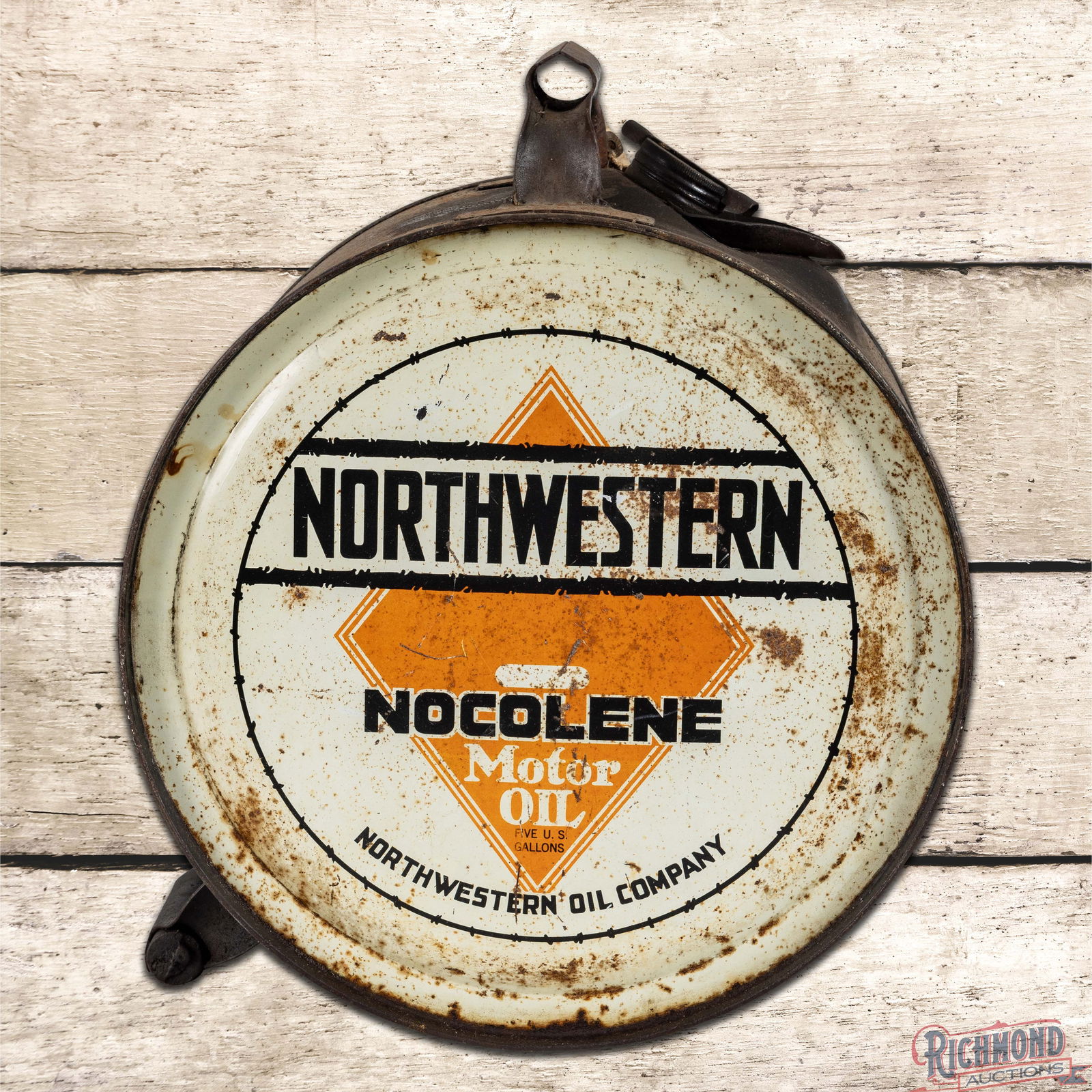 Northwestern Nocolene 5 Gallon Metal Rocker Oil Can: Empty metal rocker can with the original cap has good color and shine. The display has areas of general wear throughout with oxidation, scratches and a faint indentation in the right field. The