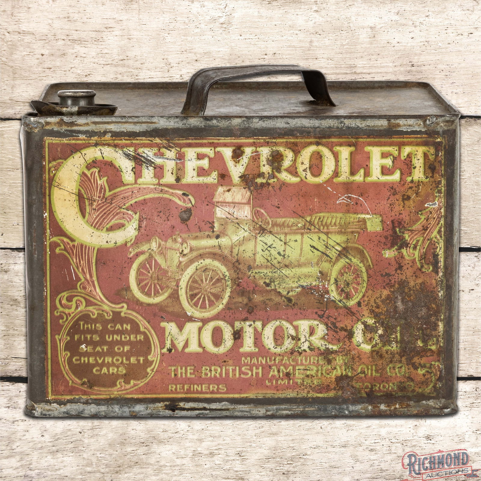 Scarce Chevrolet British American Motor Oil Metal Can w/ Early Automobile: Outstanding early Chevrolet Motor Oil metal can features detailed graphics of an early automobile on each side. The display exhibits fine scratches, paint chips and areas of oxidation. The sides have