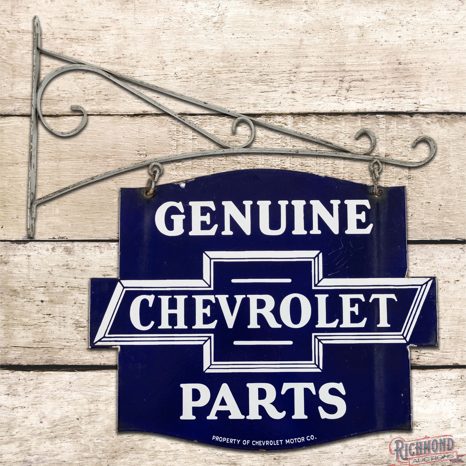 Fantastic Chevrolet Genuine Parts Double Sided Porcelain Die Cut Sign w/ Bracket: Iconic DSP (Double Sided Porcelain) die cut sign with a metal hanging bracket has excellent color and gloss. The display has a clean field with minor factory imperfections. The perimeter has chips alo