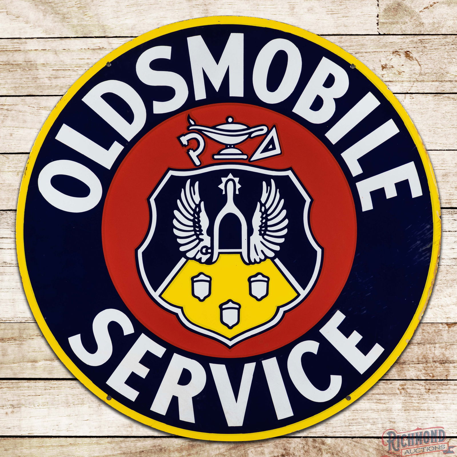 Oldsmobile Service 42" Double Sided Porcelain Sign w/ Crest Logo: DSP (Double Sided Porcelain) sign has outstanding color and gloss. The display has a clean field with a few tiny factory imperfections in the logo. The right outer field and perimeter have areas of di