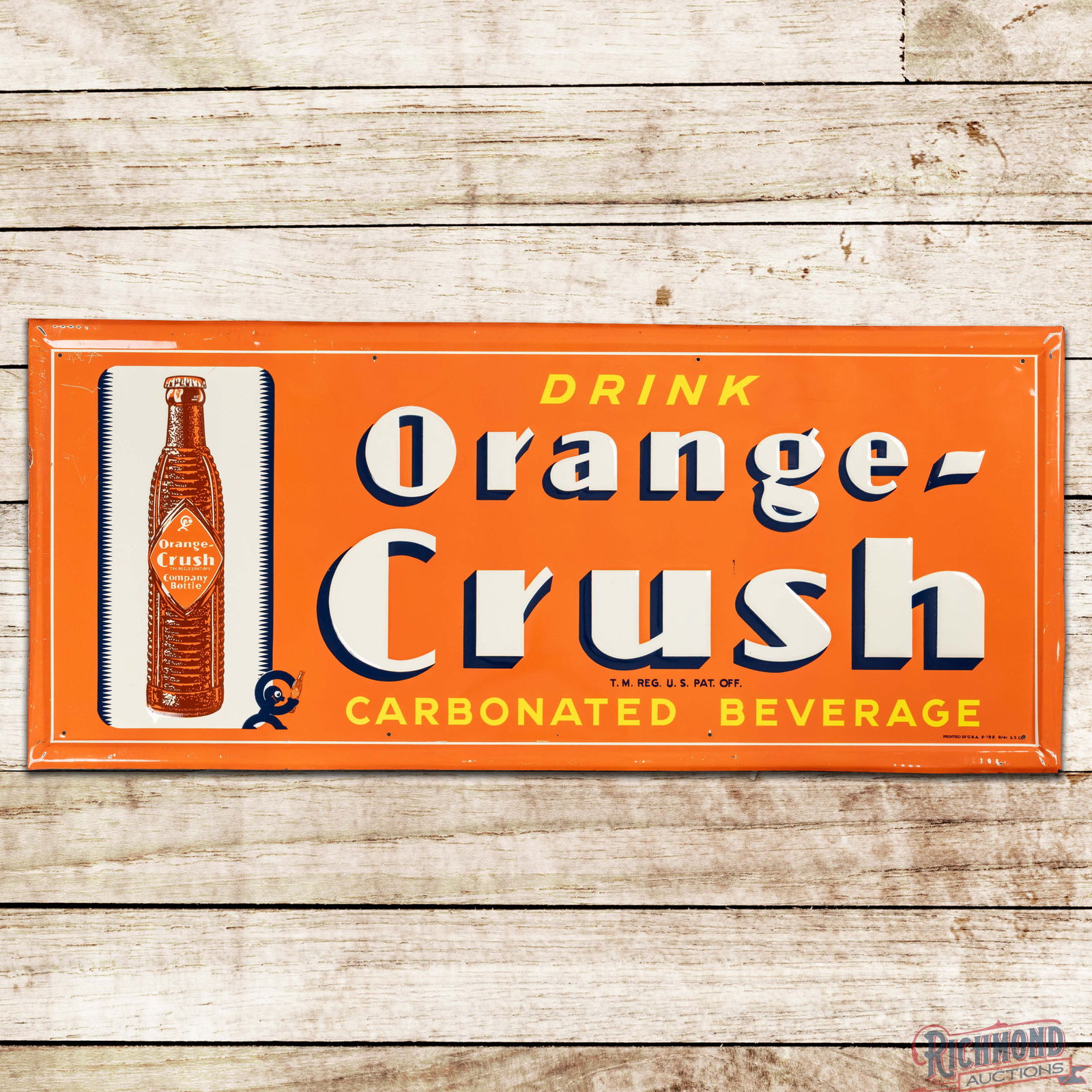 1941 Drink Orange Crush Carbonated Beverages Emb. Single Sided Tin Sign w/ Crushy & Bottle: SST (Single Sided Tin) embossed self-framed sign has excellent color and shine. The field has a small scratch near the "S" in Crush with other fine scratches near the bottle graphic. The perimeter