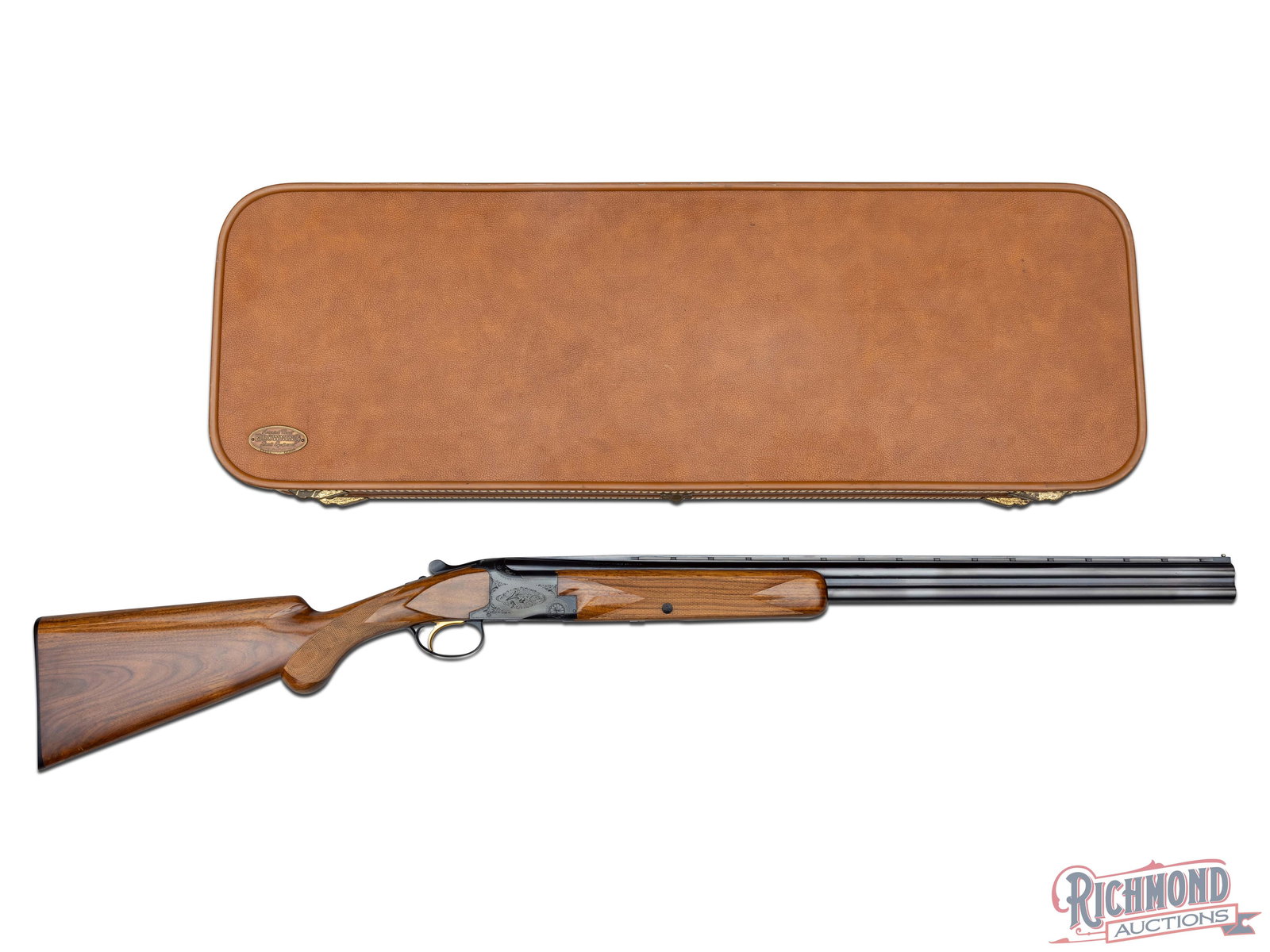 1967 Belgian Browning Superposed Lightning 20 Gauge Over/Under Shotgun in Factory Case: Manufactured by Browning in Belgium in 1967. Features 26-1/2" blued Special Steel ventilated rib barrels with a nickel bead front sight. 20 gauge chambered for 2-3/4" and 3" shells. Choke symbols indi