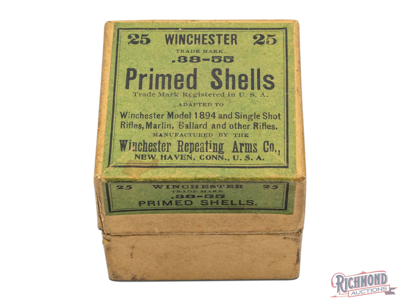 Full Box Of Winchester .38-55 Primed Shells Two Piece Box: This box contains 25 .38-55 Primed Shells made by Winchester Repeating Arms Co. The two piece box has a green label on the top and front and states ".38-55 Primed Shells, Adapted To Winchester Model 1
