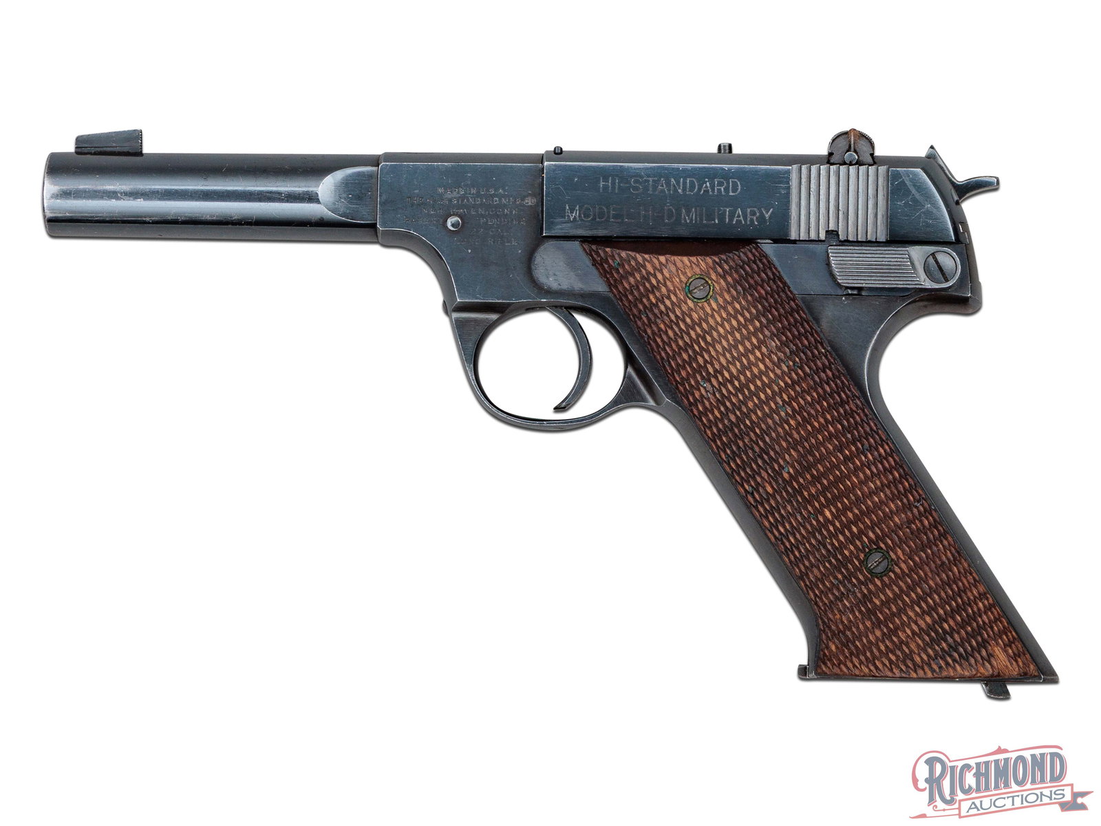 High Standard H-D Military .22 LR Semi-Automatic Pistol: Manufactured by High Standard circa 1950. This pistol features a 4-1/2" blued bull barrel with rear adjustable square notch sight and serrated front blade sight. Semi-automatic single/double action wi