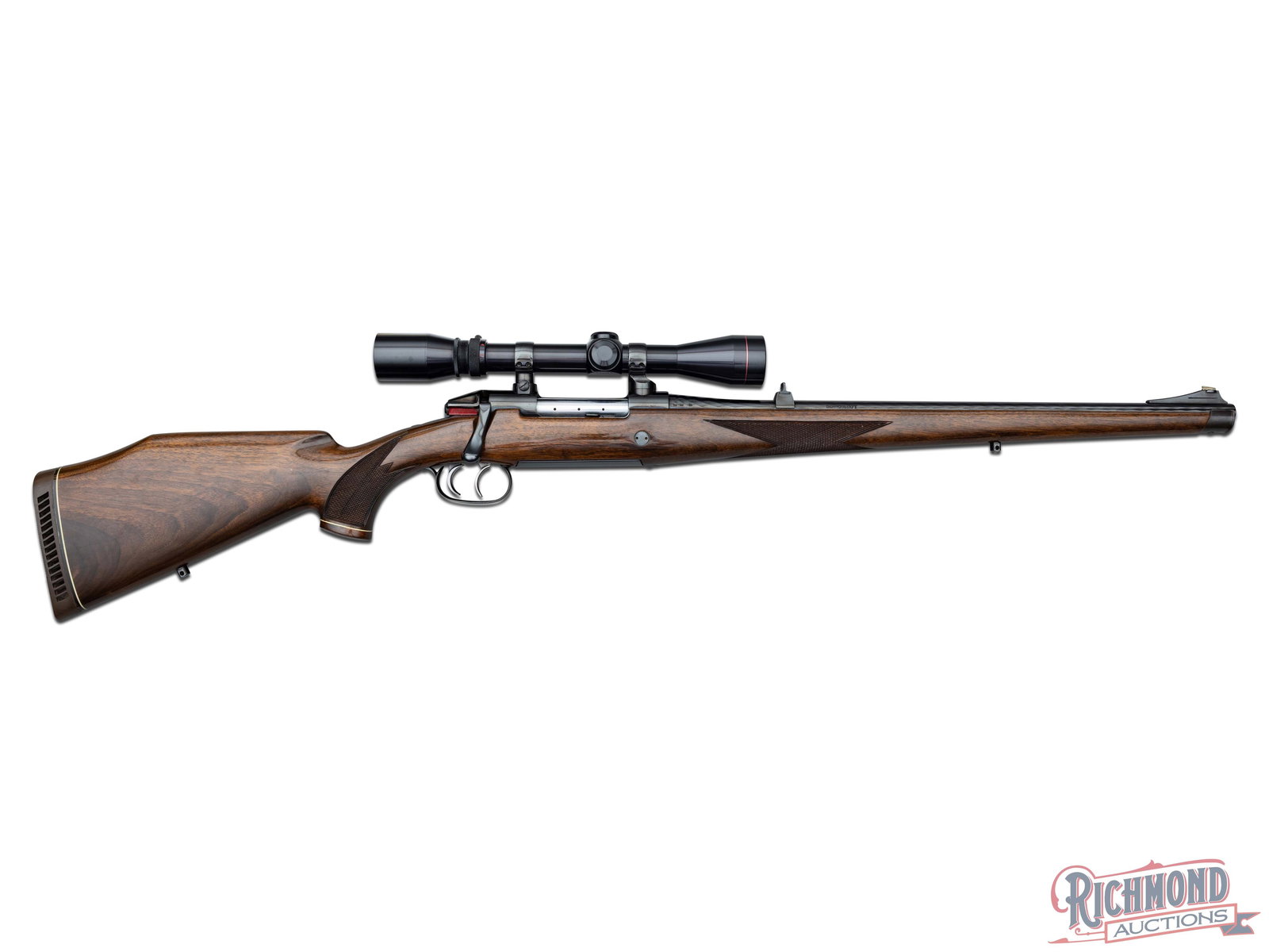 Stunning Steyr Mannlicher Schonauer M72 .308 Bolt Action Rifle With Factory Scope: Manufactured in Austria by Steyr Mannlicher Schonauer in 1975. Features a 20-1/2" bright blued finish barrel in the "licorice twist" pattern. Left side of the barrel is marked "LE.S. SKOKIE ILL. / .30