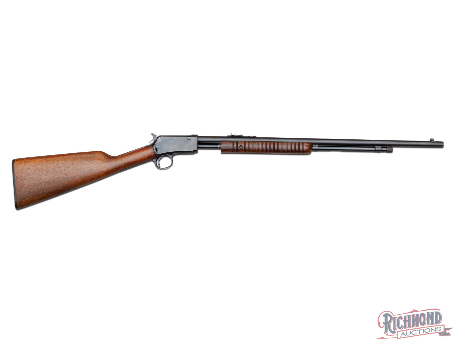 Pre '64 Winchester Model 62A .22 Short / Long / LR Slide Action Rifle: Manufactured by Winchester Repeating Arms Company in 1957. Features a blued Winchester proofed 23" round barrel with standard rear notch and blade front sight. Barrel is marked with a Winchester two l