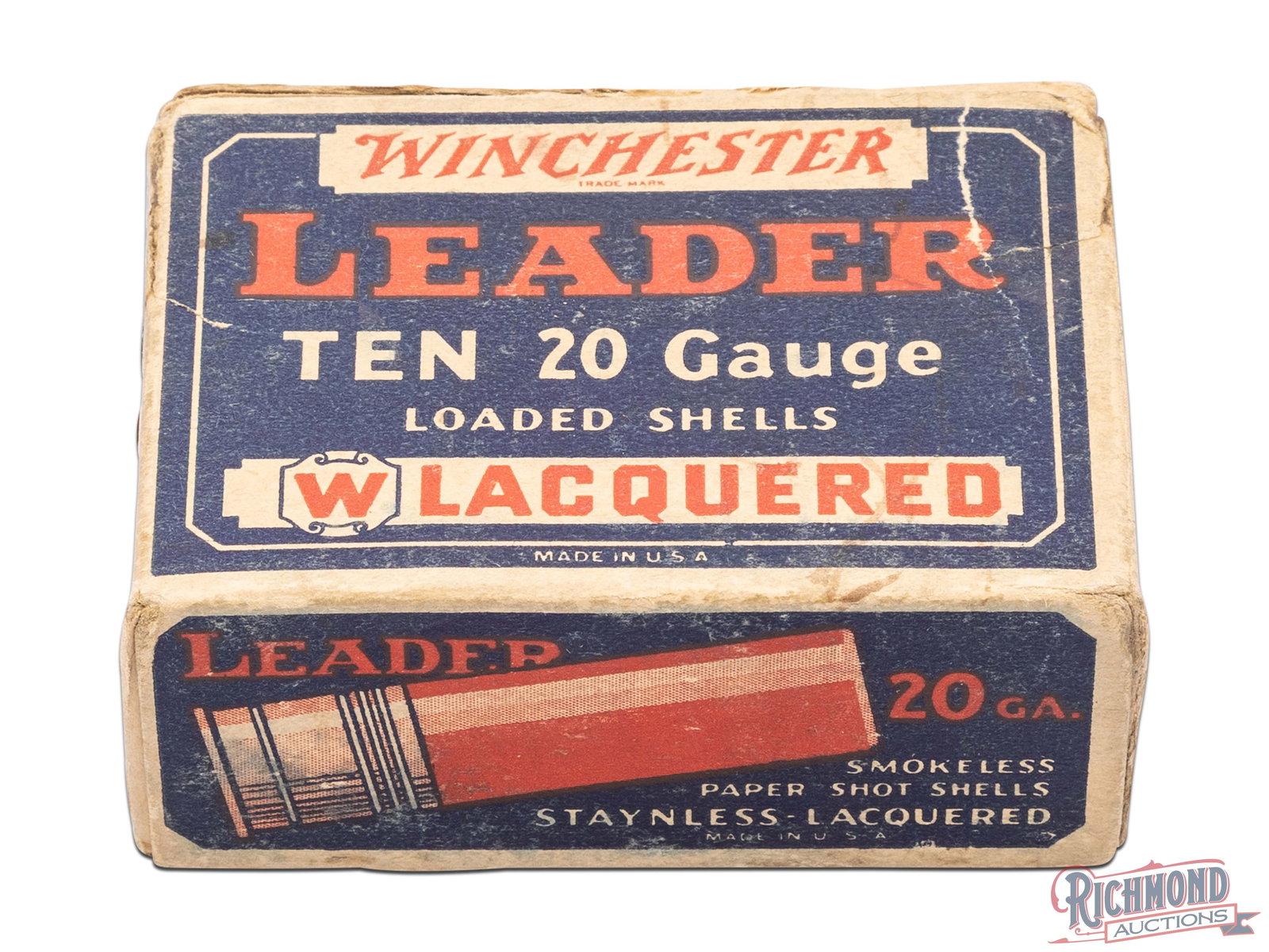 Full Box Of Winchester Leader 20 Gauge Loaded Lacquered 10 Shell Box: This is a full 10 round box of 20 gauge lacquered shells made by Winchester Repeating Arms Co. The blue box has the image of the shell on top and the front states "Winchester Leader Ten 20 Gauge Loade