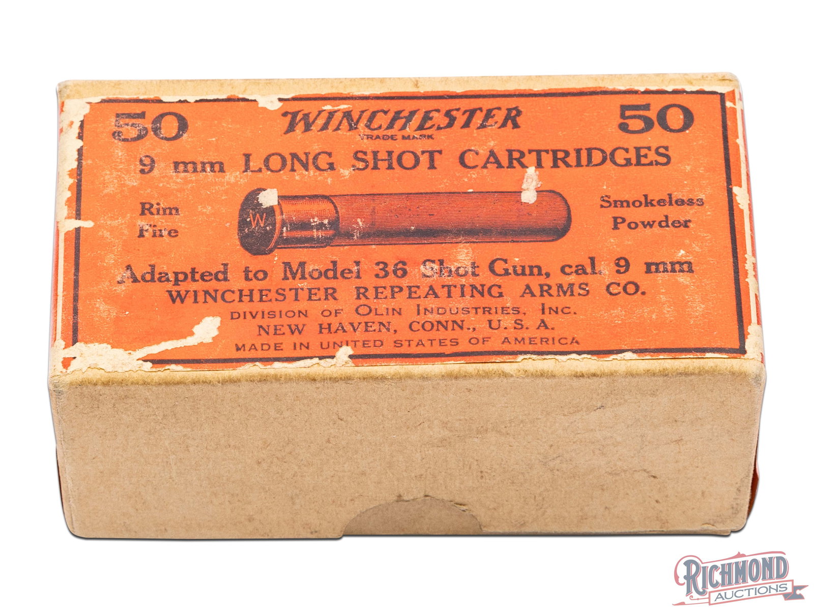 Sealed Box Of Winchester 9 mm Long Shot Rimfire Smokeless Cartridges: This is a factory sealed box of 9mm long shot rimfire cartridges made by Winchester Repeating Arms Co. This two piece box has a red label that is still sealed to the bottom of the box. The top label h